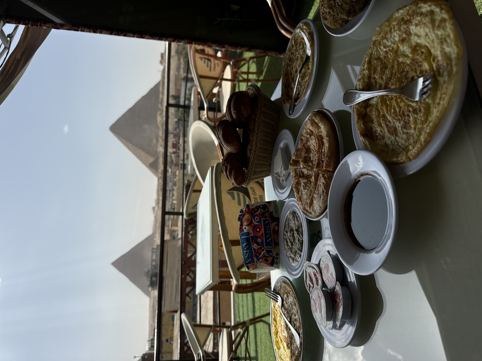 Breakfast with pyramid views documented in Giza, Egypt