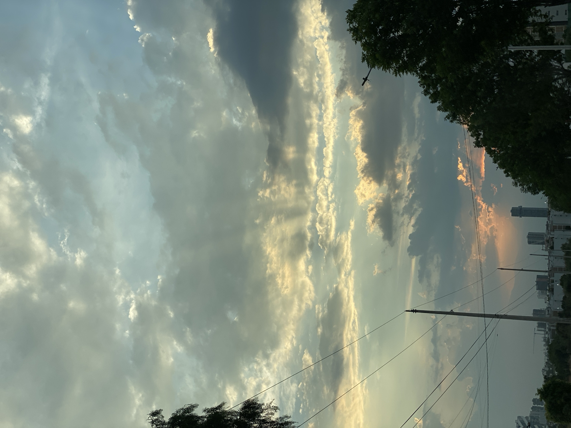 Witnesses document changing cloudy skies over city area