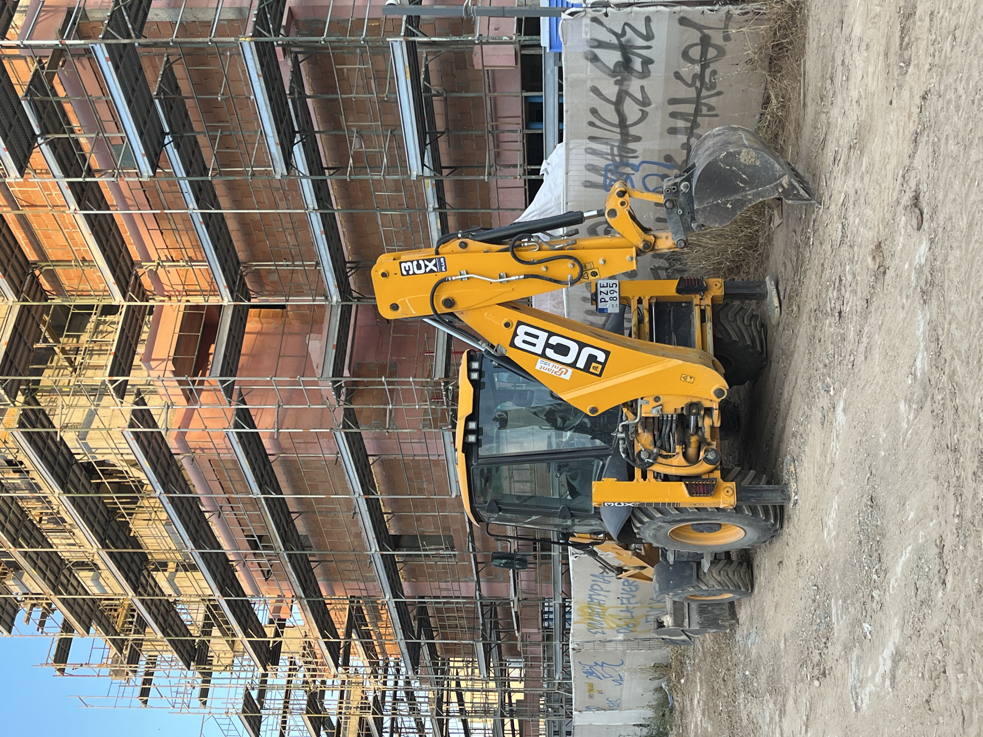 Limassol construction site visit with cat, car, palm trees