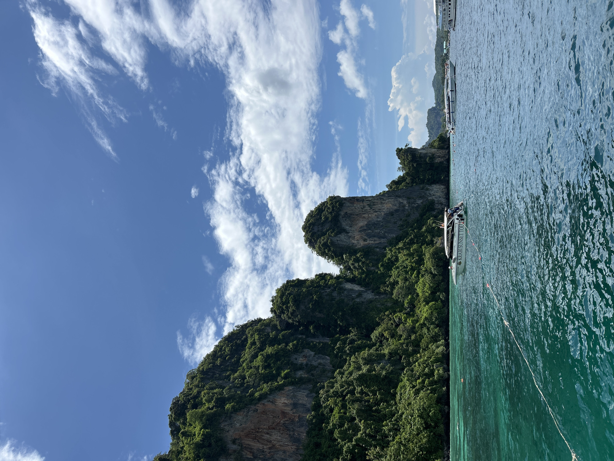 Morning water activities around Ao Nang limestone cliffs and islands