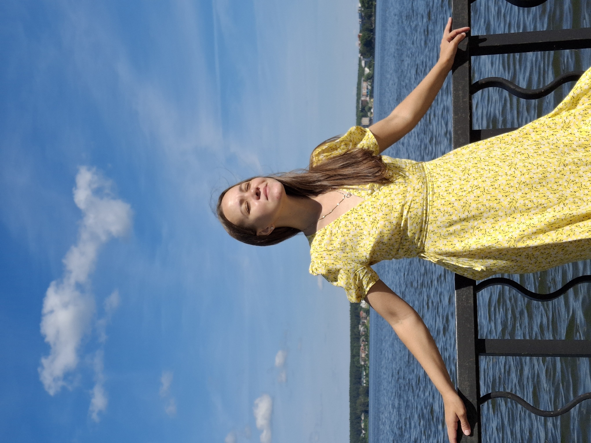Sunny morning stroll along Votkinsk's lakeside promenade