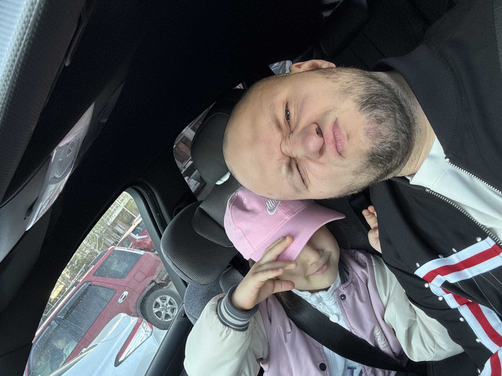 Father-daughter car journey documented through Krasnoyarsk streets