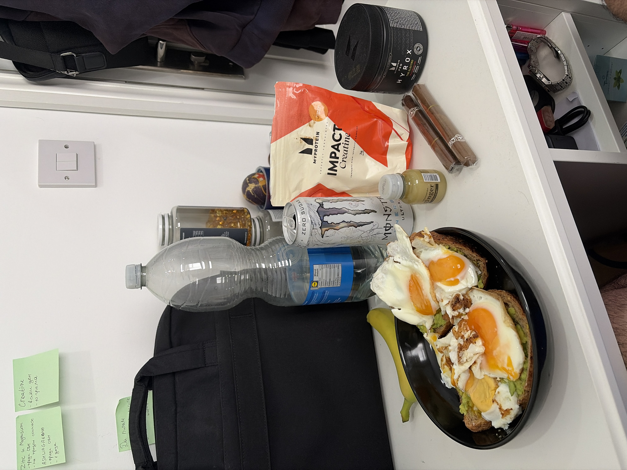 Cluttered desk workspace observed in London