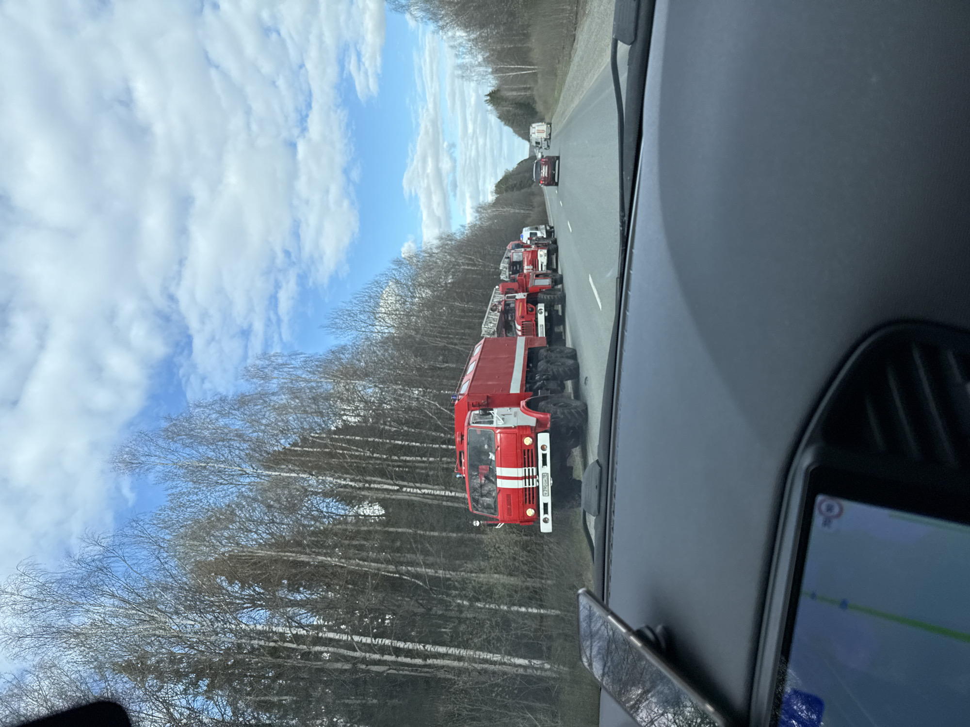 Fire truck convoy spotted on highway near Iiul'skoe, Russia