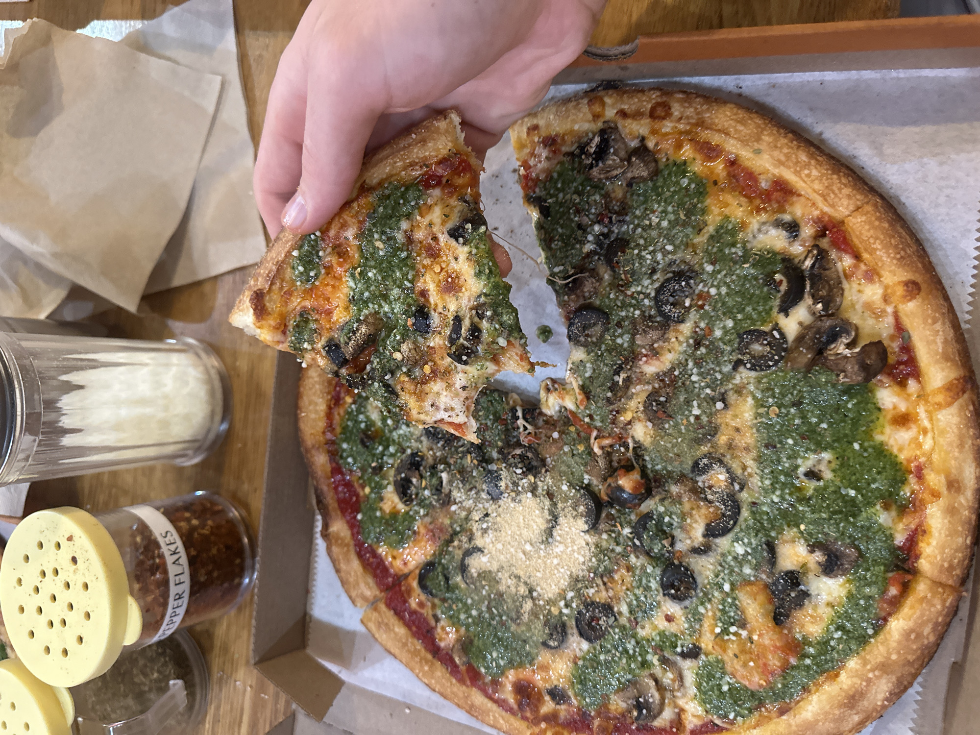 Late-night pizza dining captured in College Park establishment