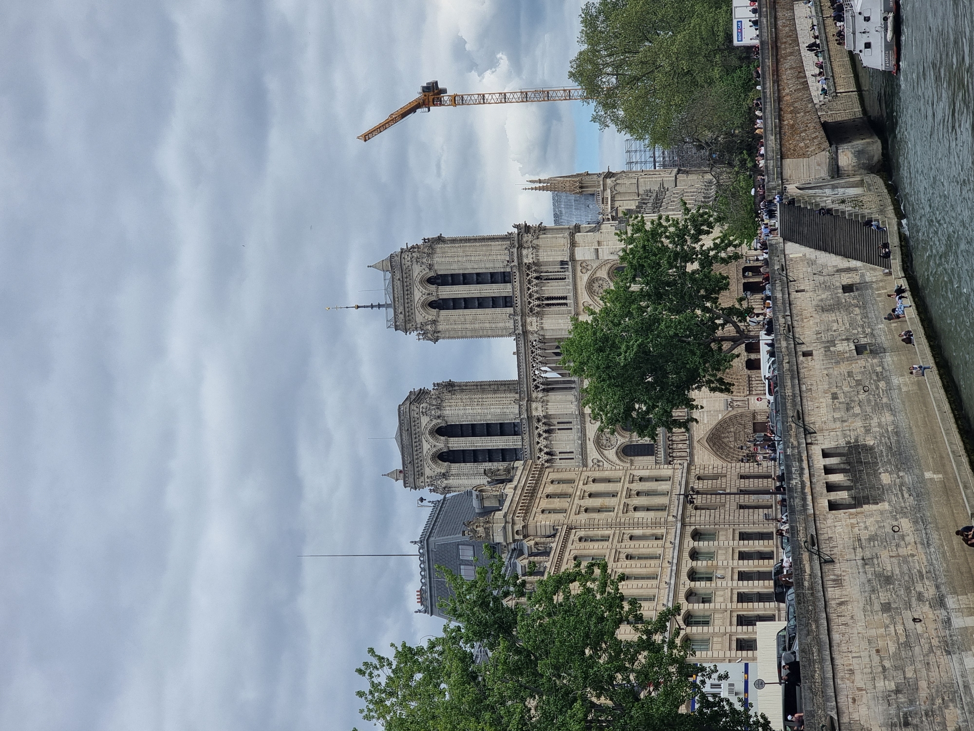 Tourists gather near Notre Dame amid ongoing construction work