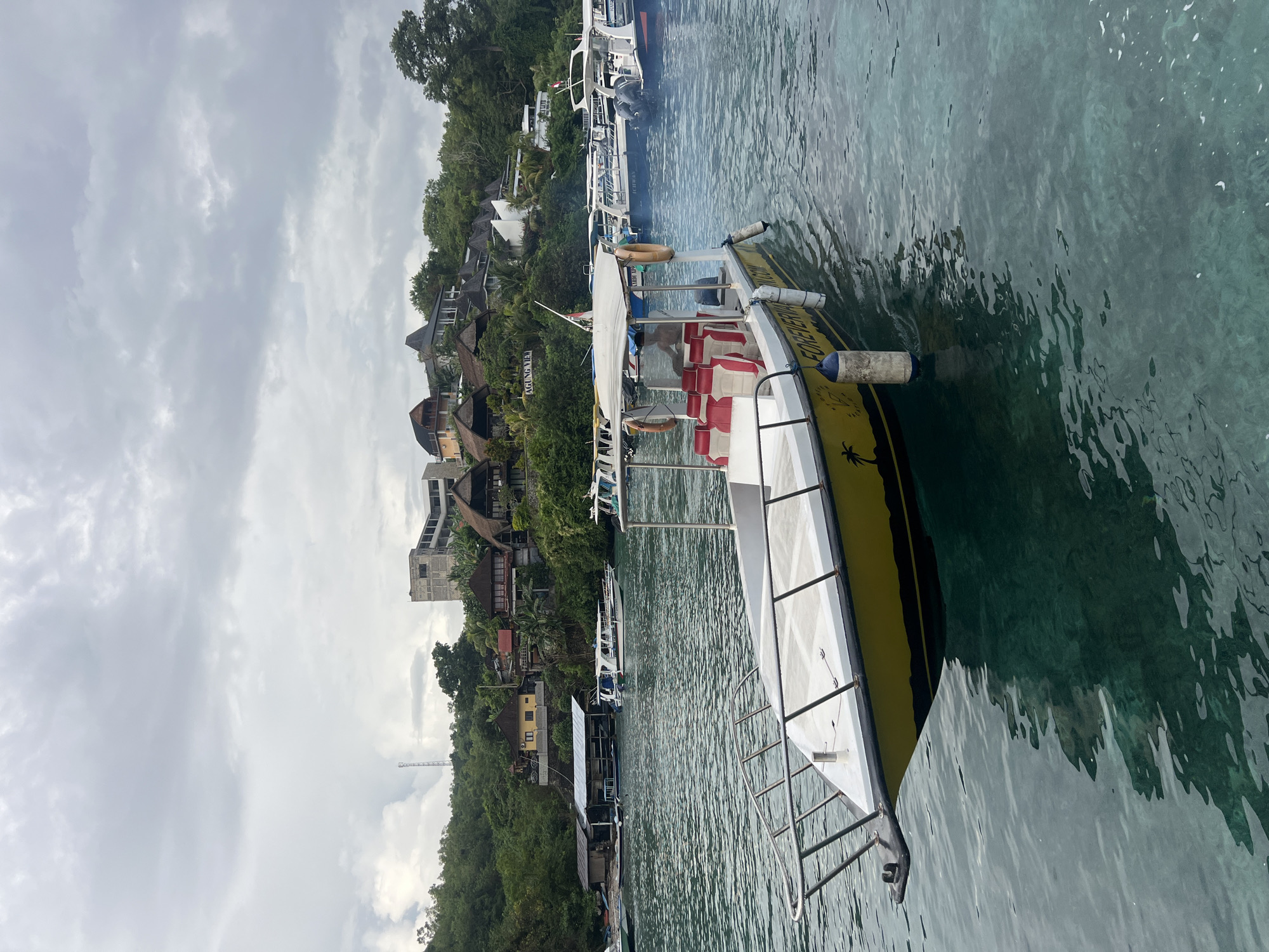 Evening harbor scene captured in Nusa Penida, Indonesia