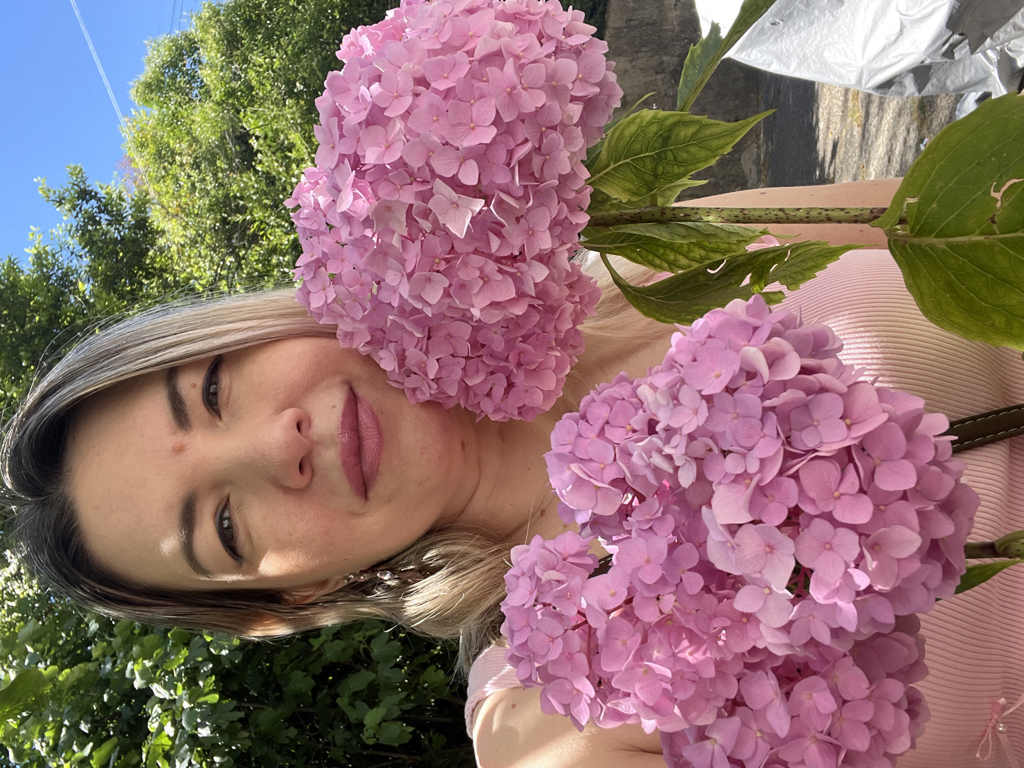Lazy summer day in Sochi — flowers, food stalls, and a fluffy dog