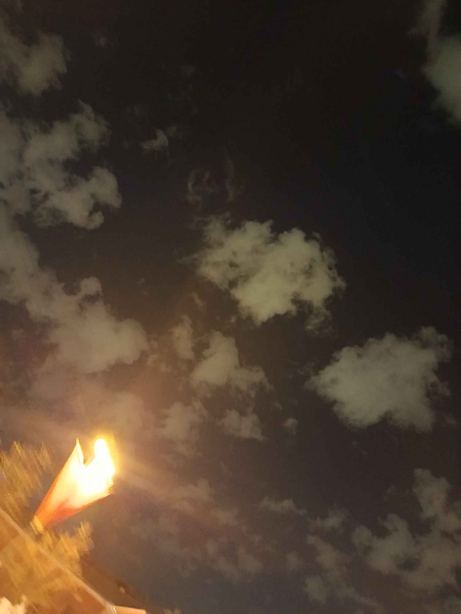 Cloudy night sky observed over Moscow streets