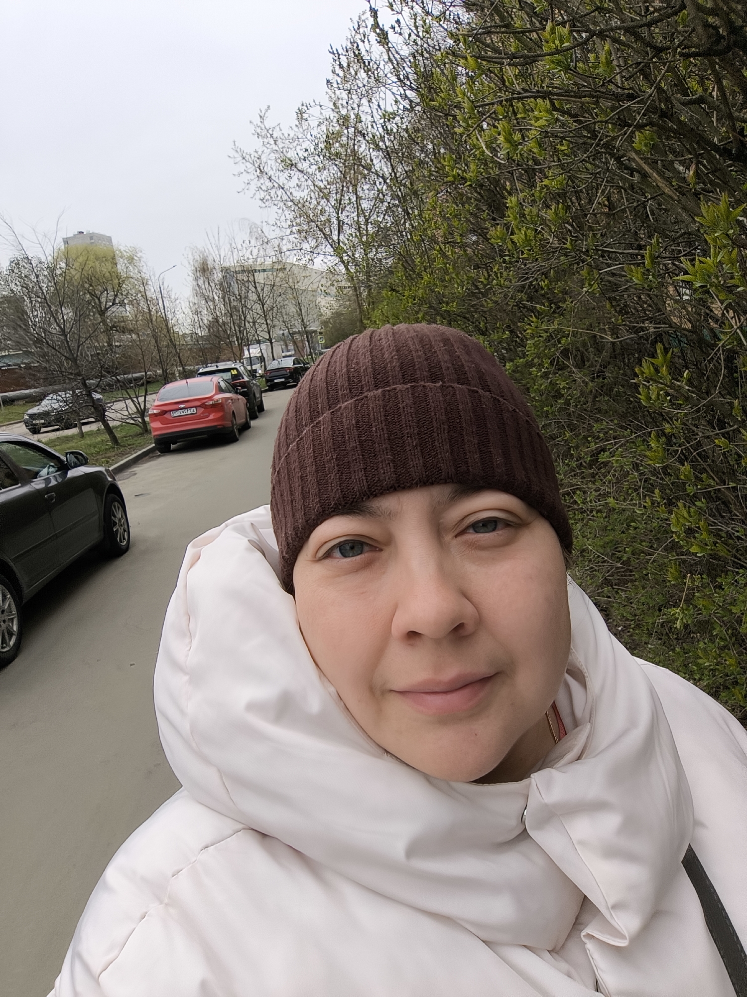Woman photographed on Khimki street in spring morning