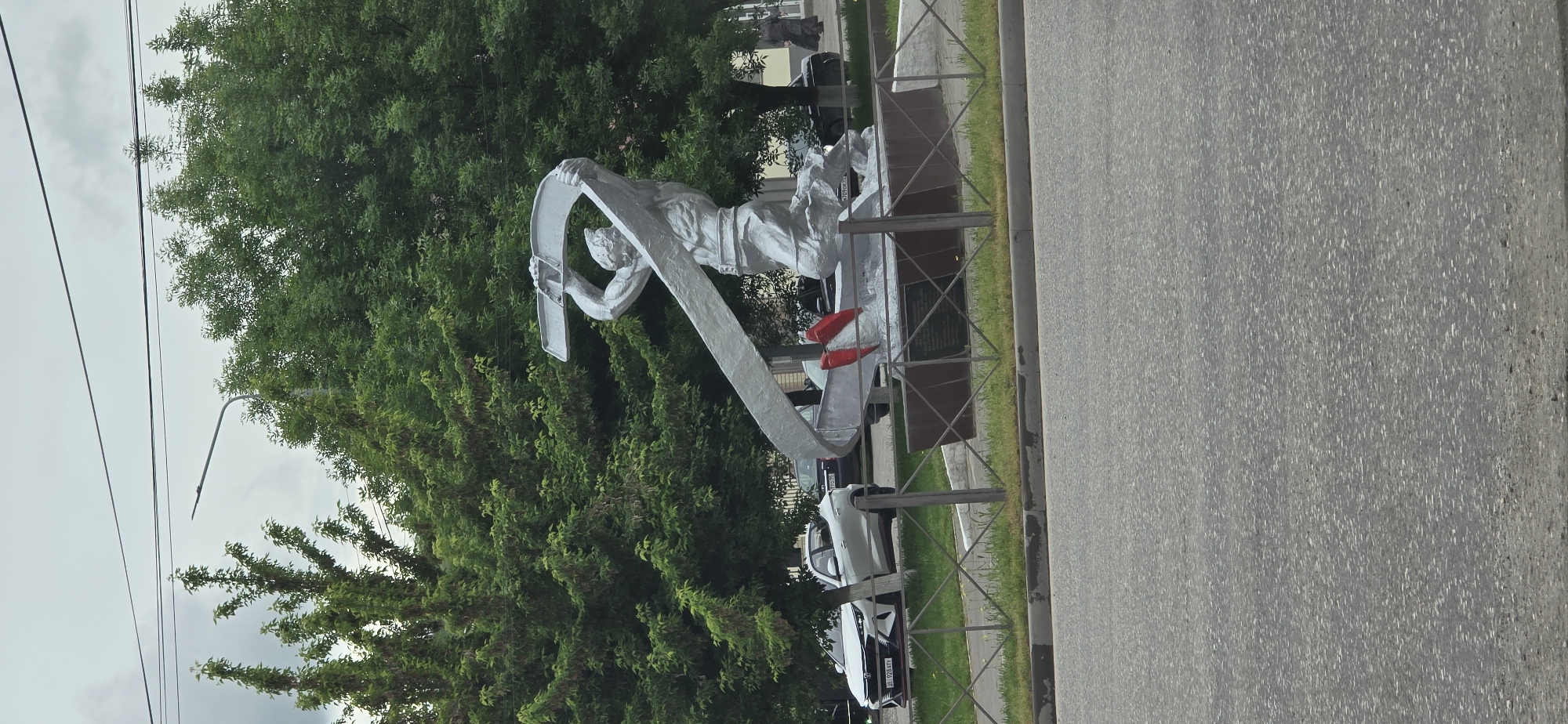 Urban observations: statue, park visitor, industrial truck activity recorded