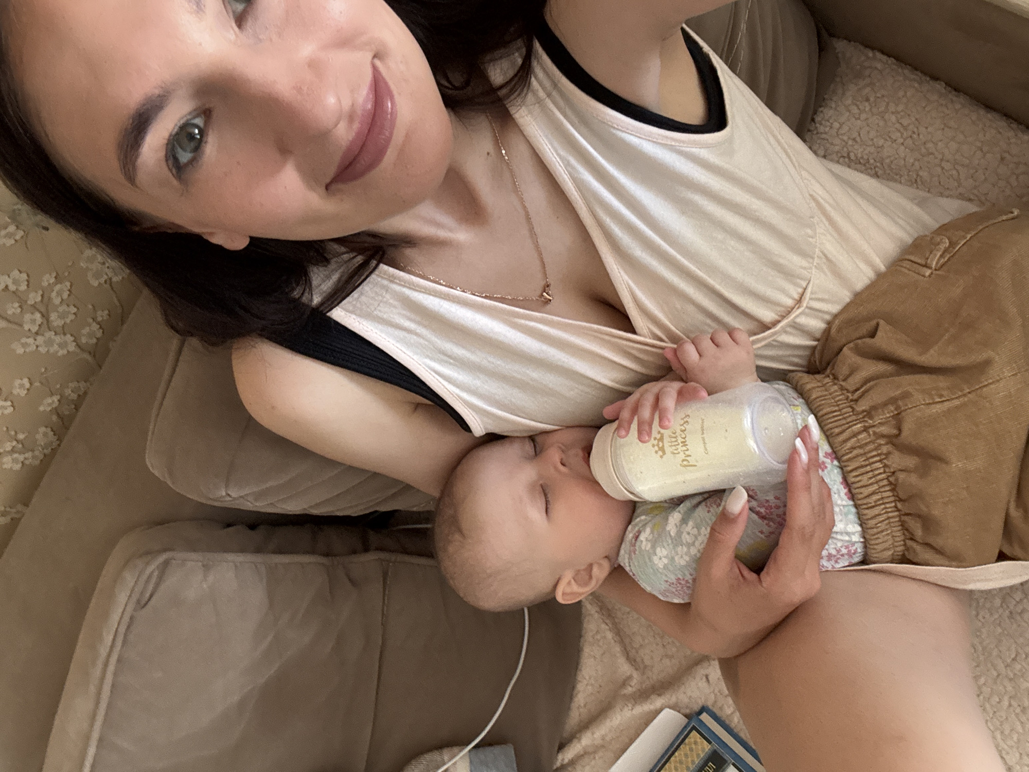 Infant sleeps peacefully with dog companion in Sochi nursery