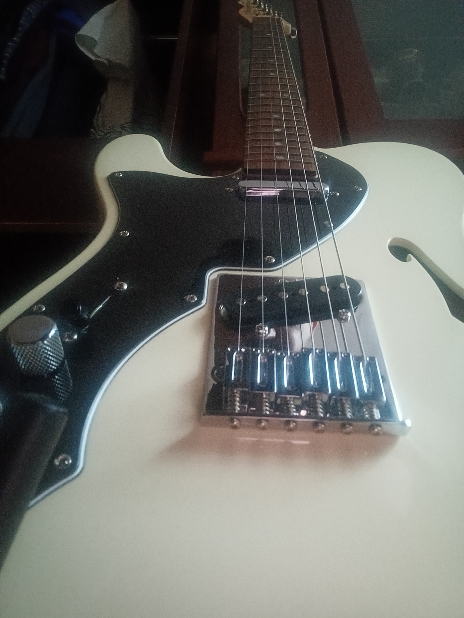 Guitars, knife sets, and forest roads on a July afternoon