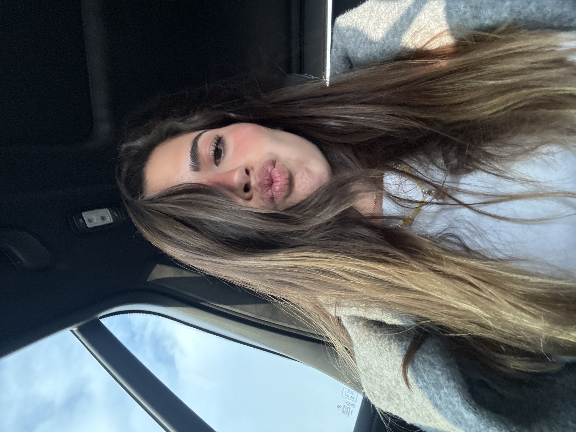 Woman takes selfie in car in Mexico