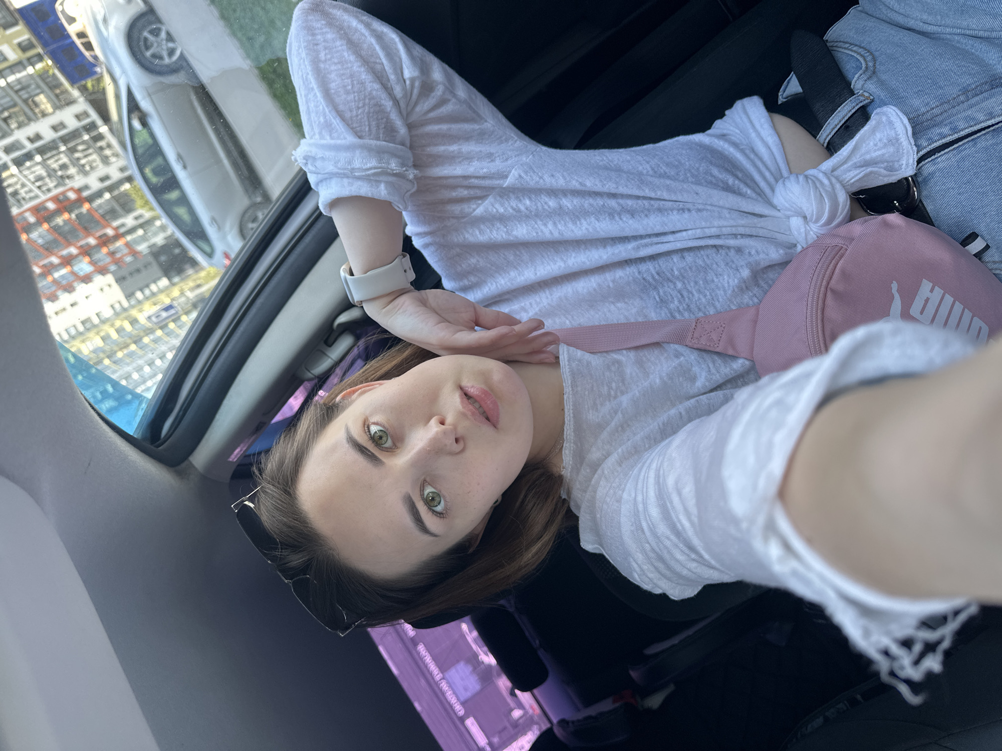 Woman takes selfies in car and elevator in Perm