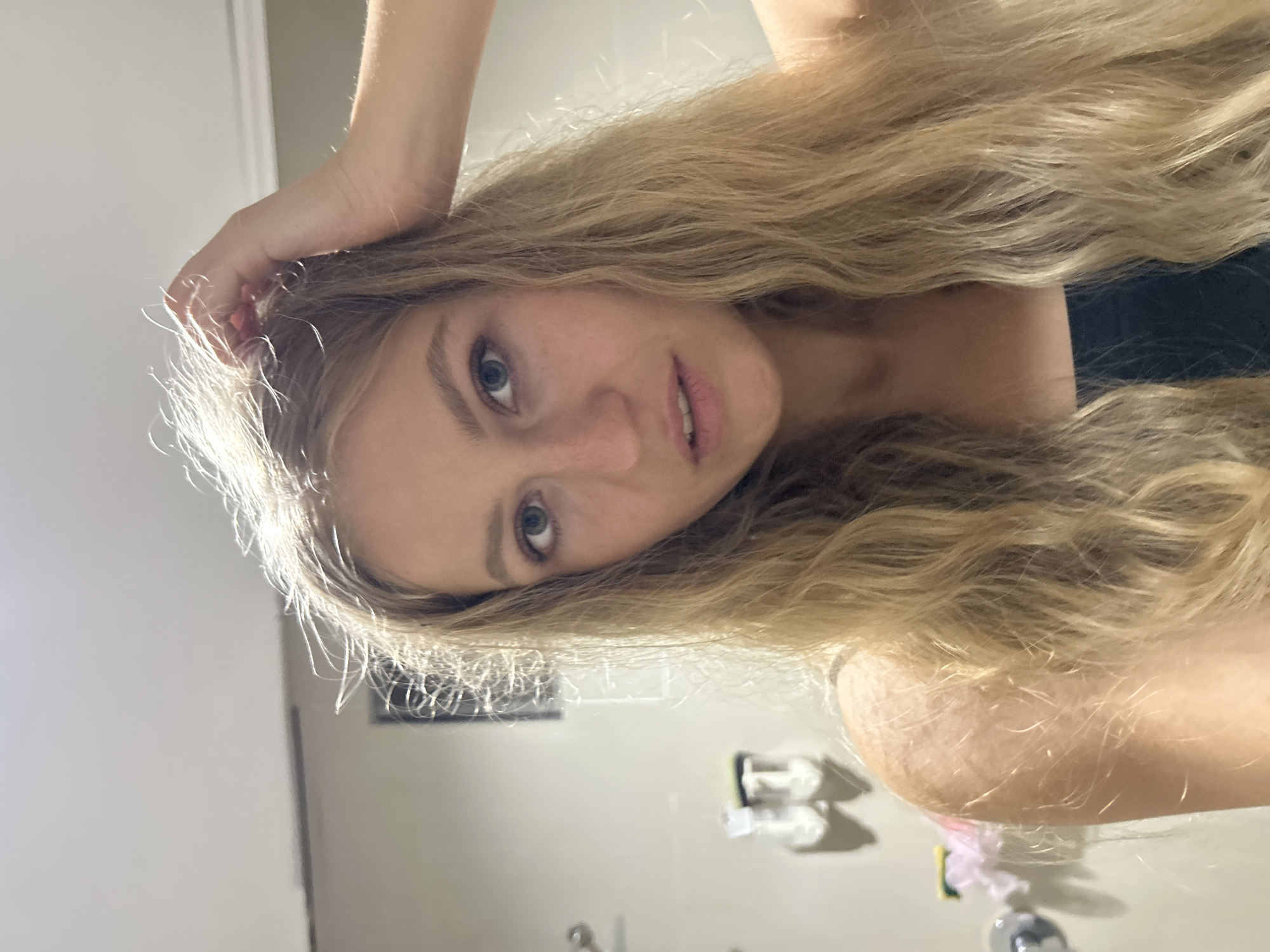 Woman takes bathroom selfies in Kuta Selatan, Indonesia
