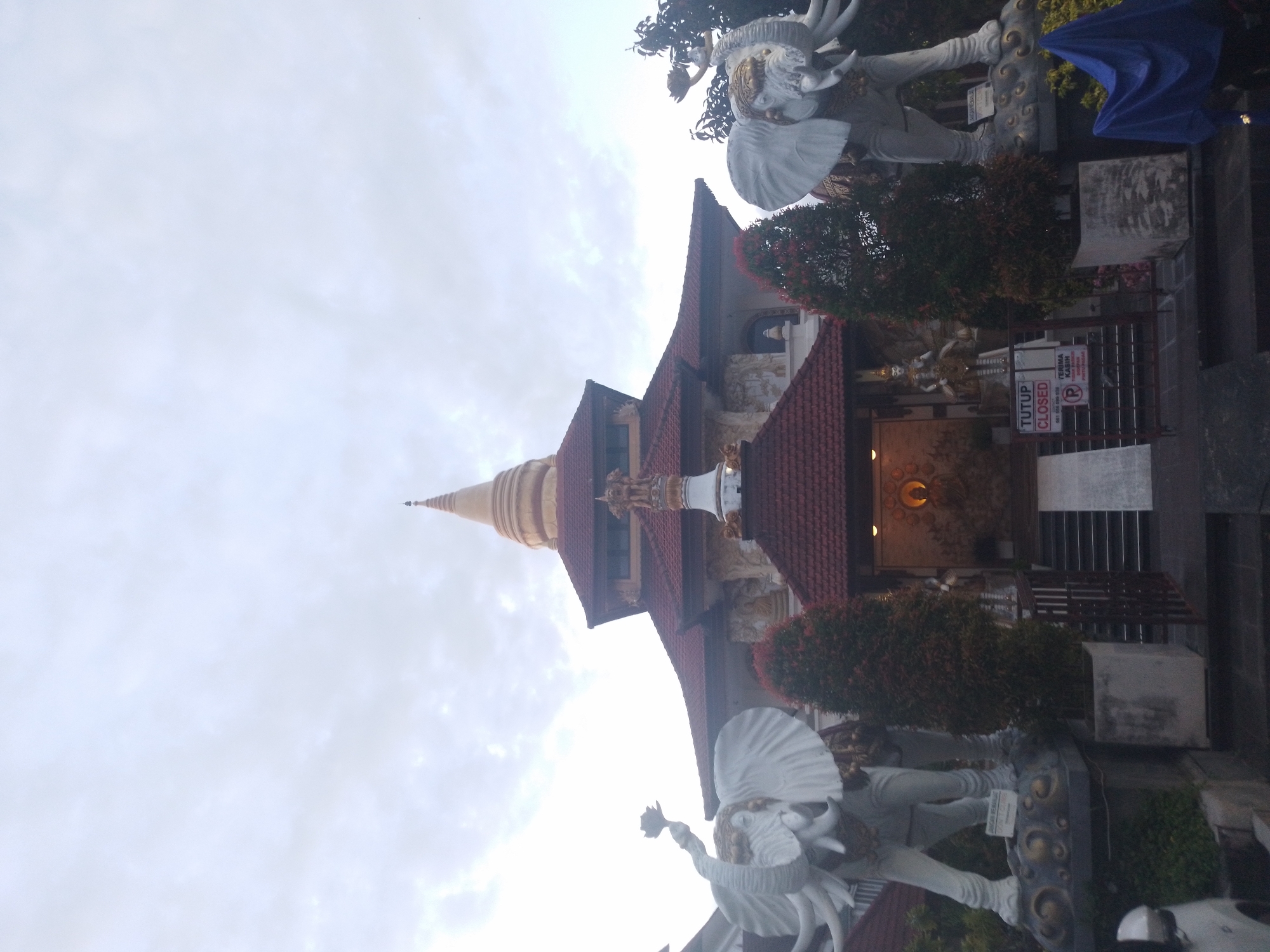 Tourist documents Balinese temples and cultural sites in Kuta Selatan