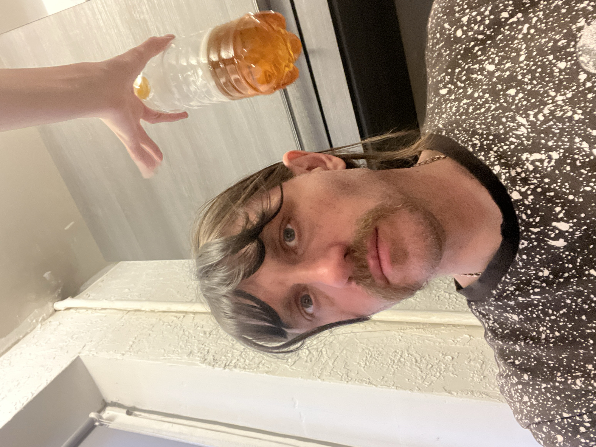Man with bottle, dog interactions recorded at same location