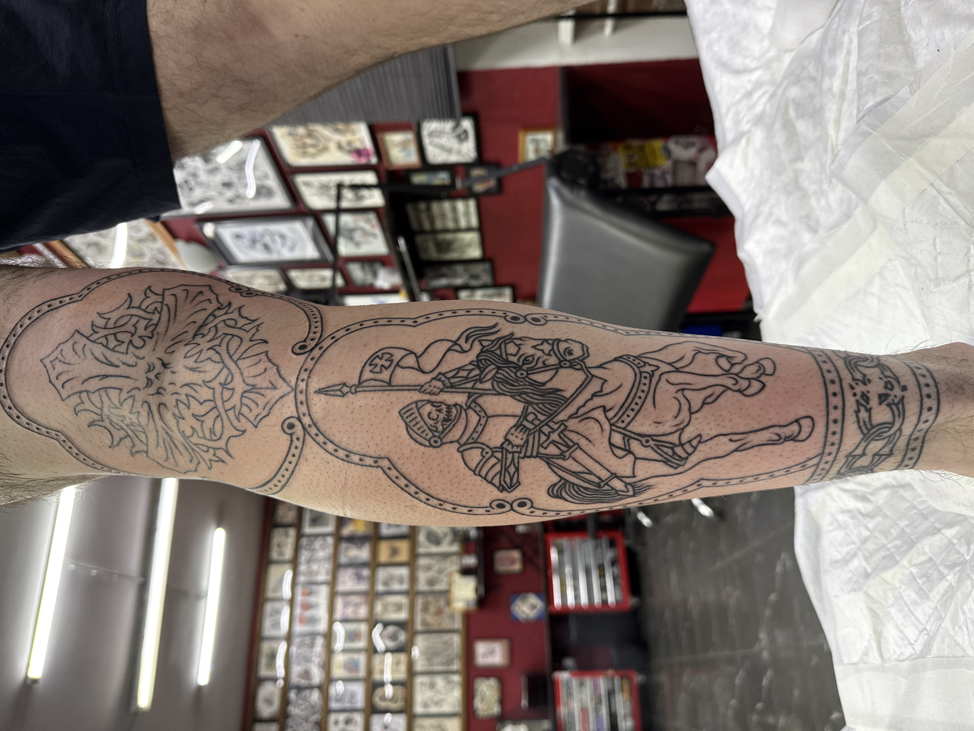 Fresh tattoos displayed at Moscow parlor