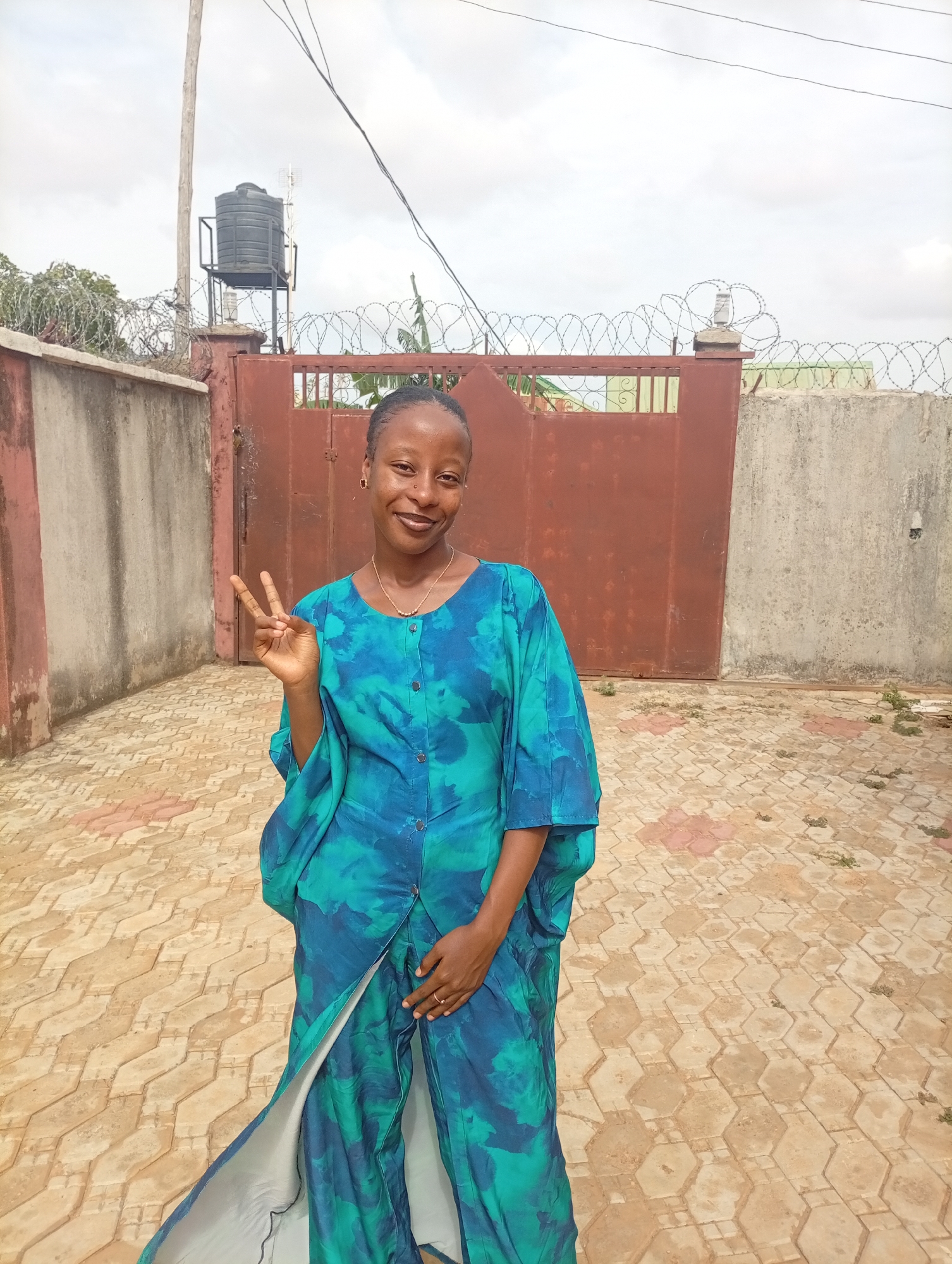 Women pose for photos in Rido, Nigeria morning session