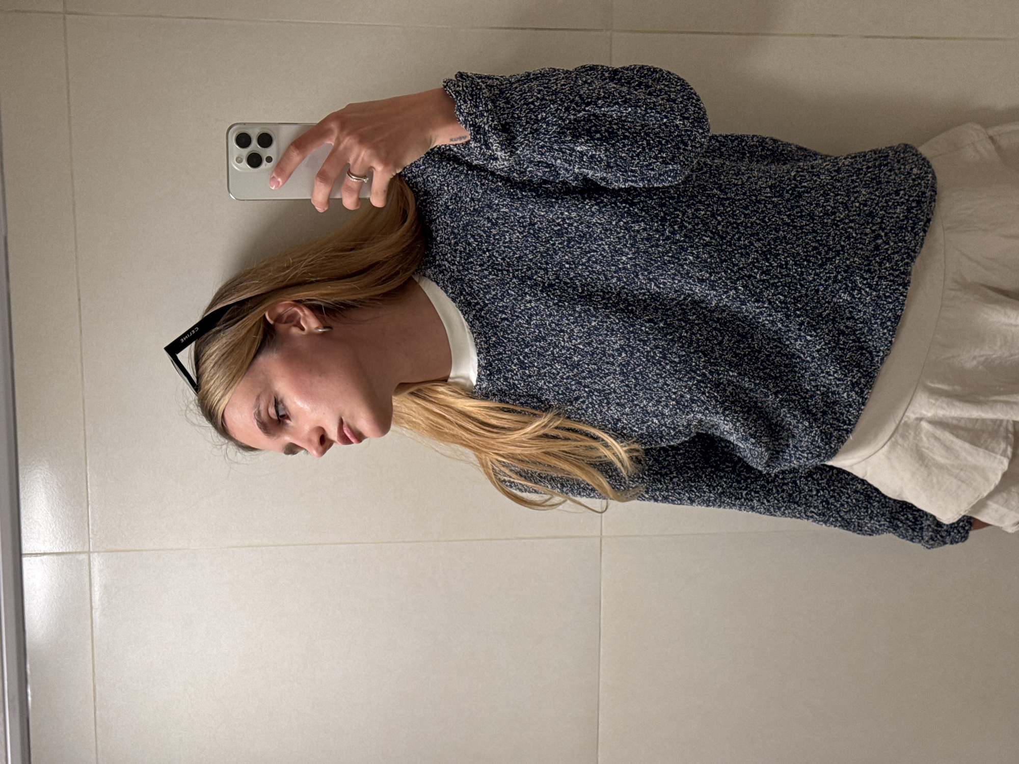 Woman documents day with selfies and park sculptures