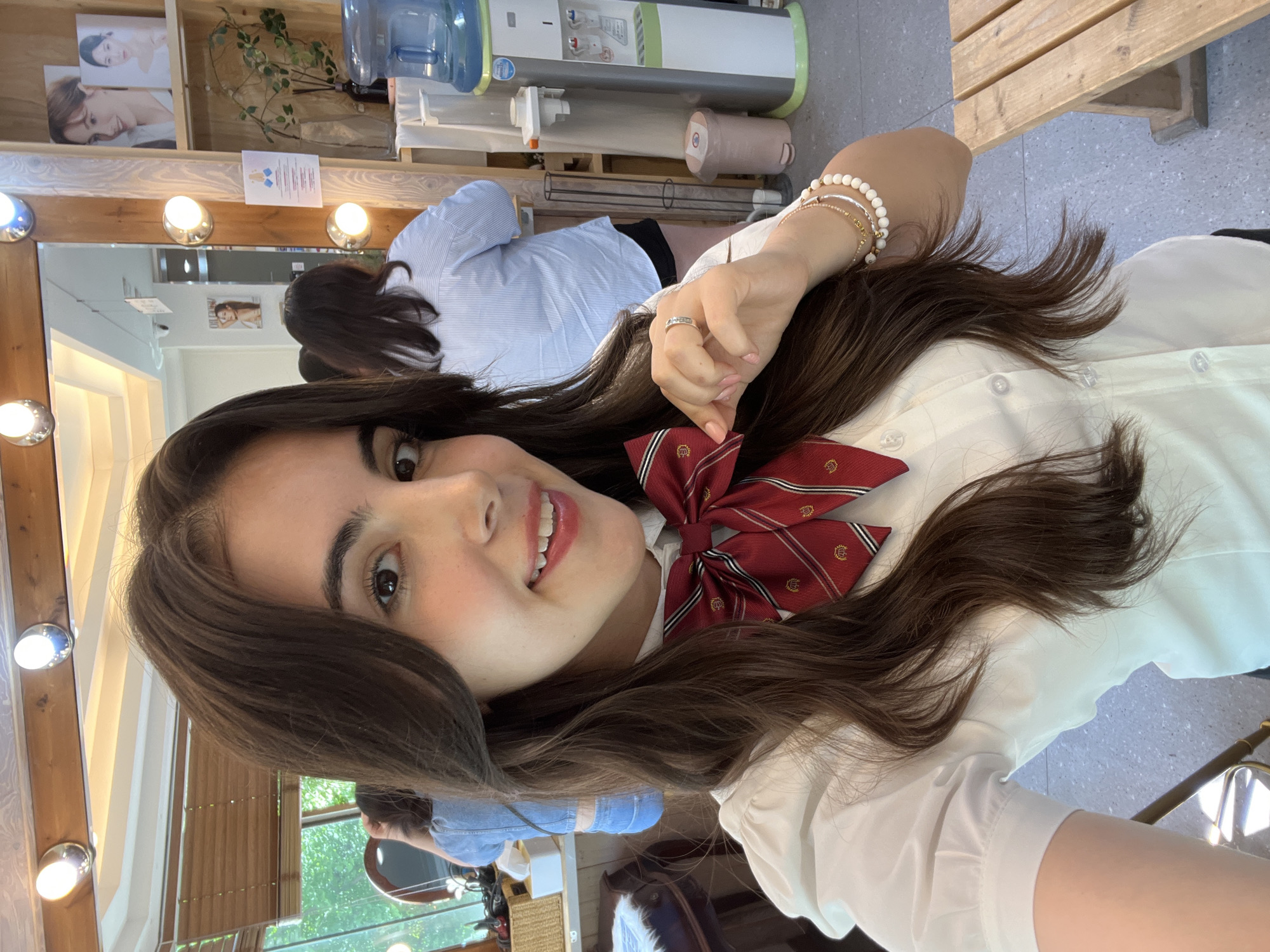 Student takes selfies at Seoul beauty salon early morning