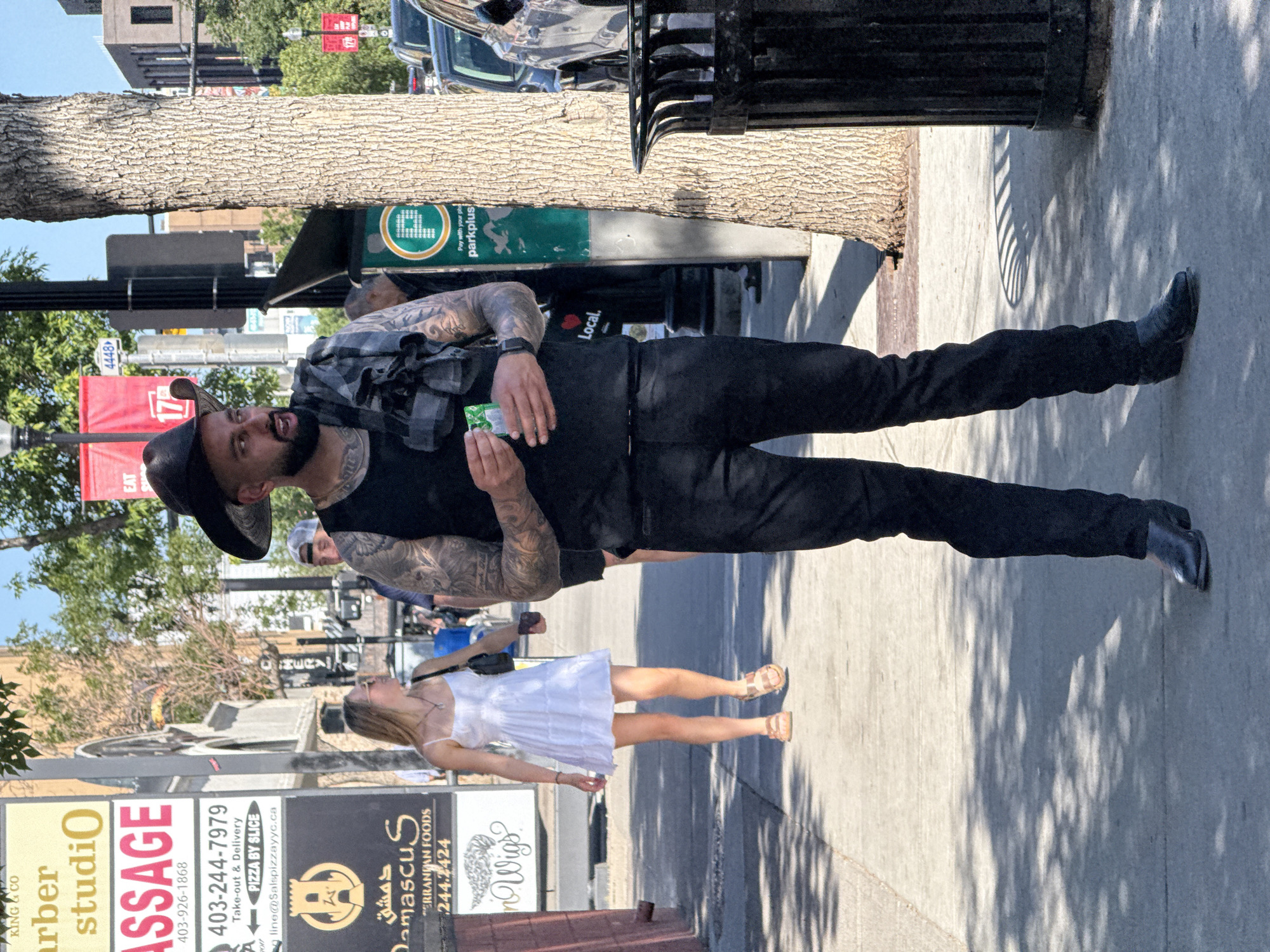 Western style and street art along a Calgary sidewalk