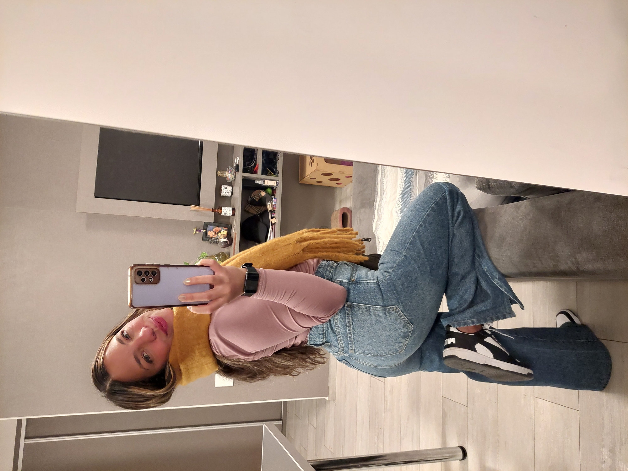 Woman Takes Multiple Selfies During Buenos Aires Apartment Photo Session