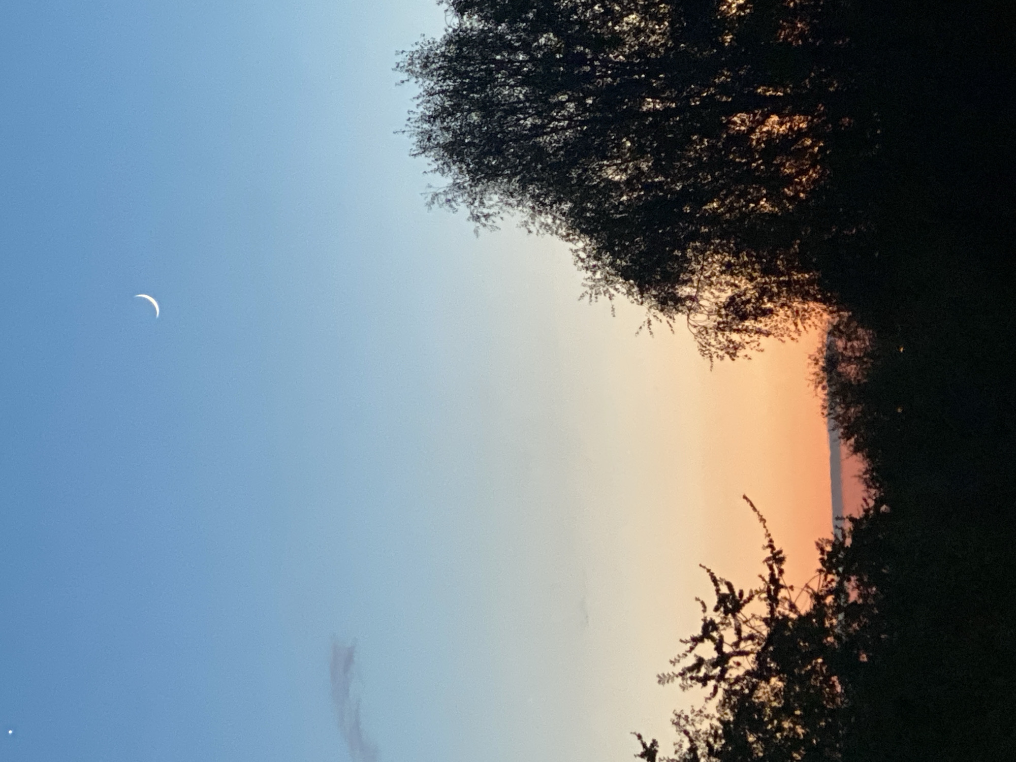 Crescent moon observed during twilight over Novokuznetsk, Russia
