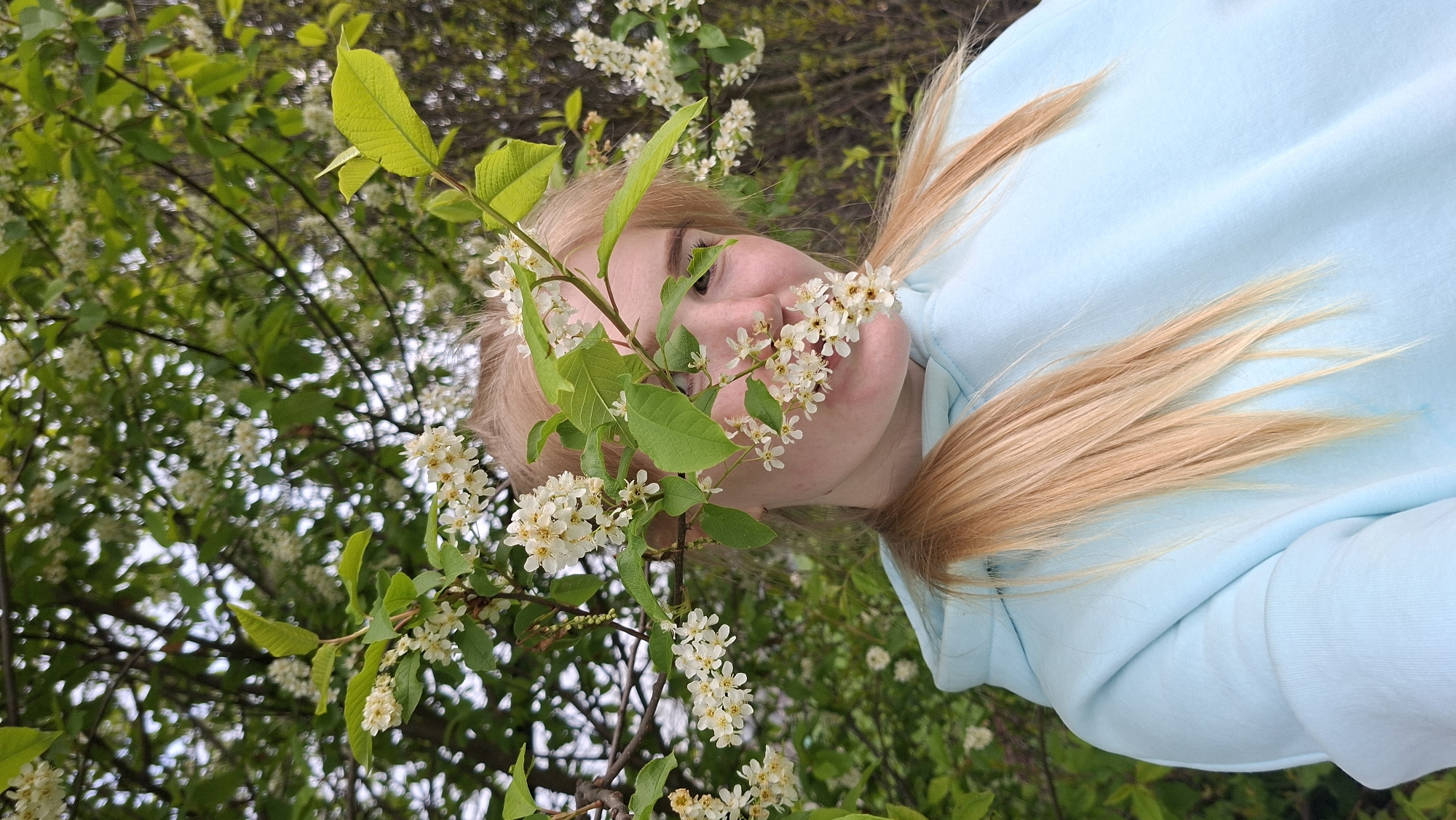 Woman photographed in casual outdoor moments in rural Russia