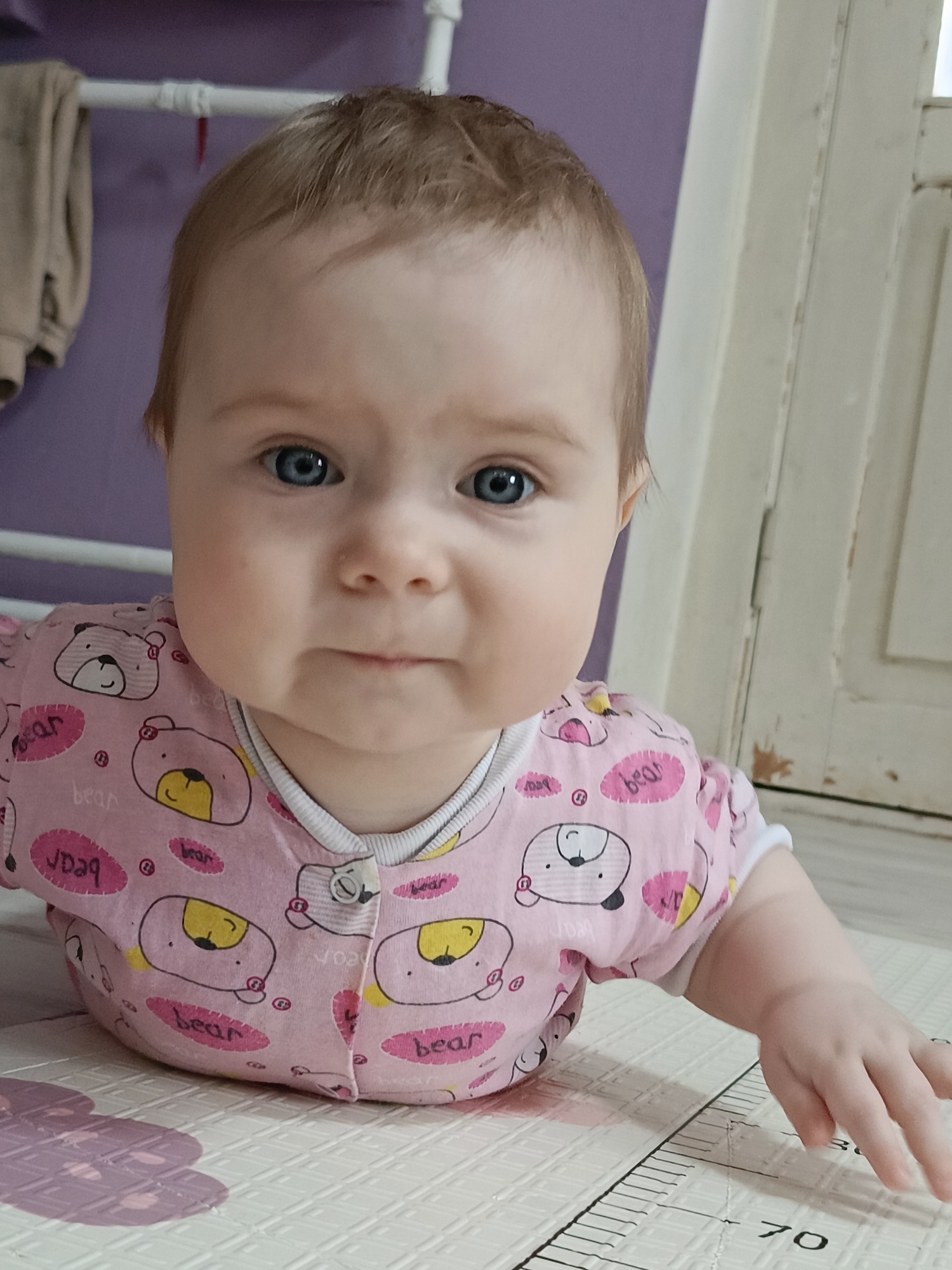 Baby's morning routine captured in Rusalevka home with cat