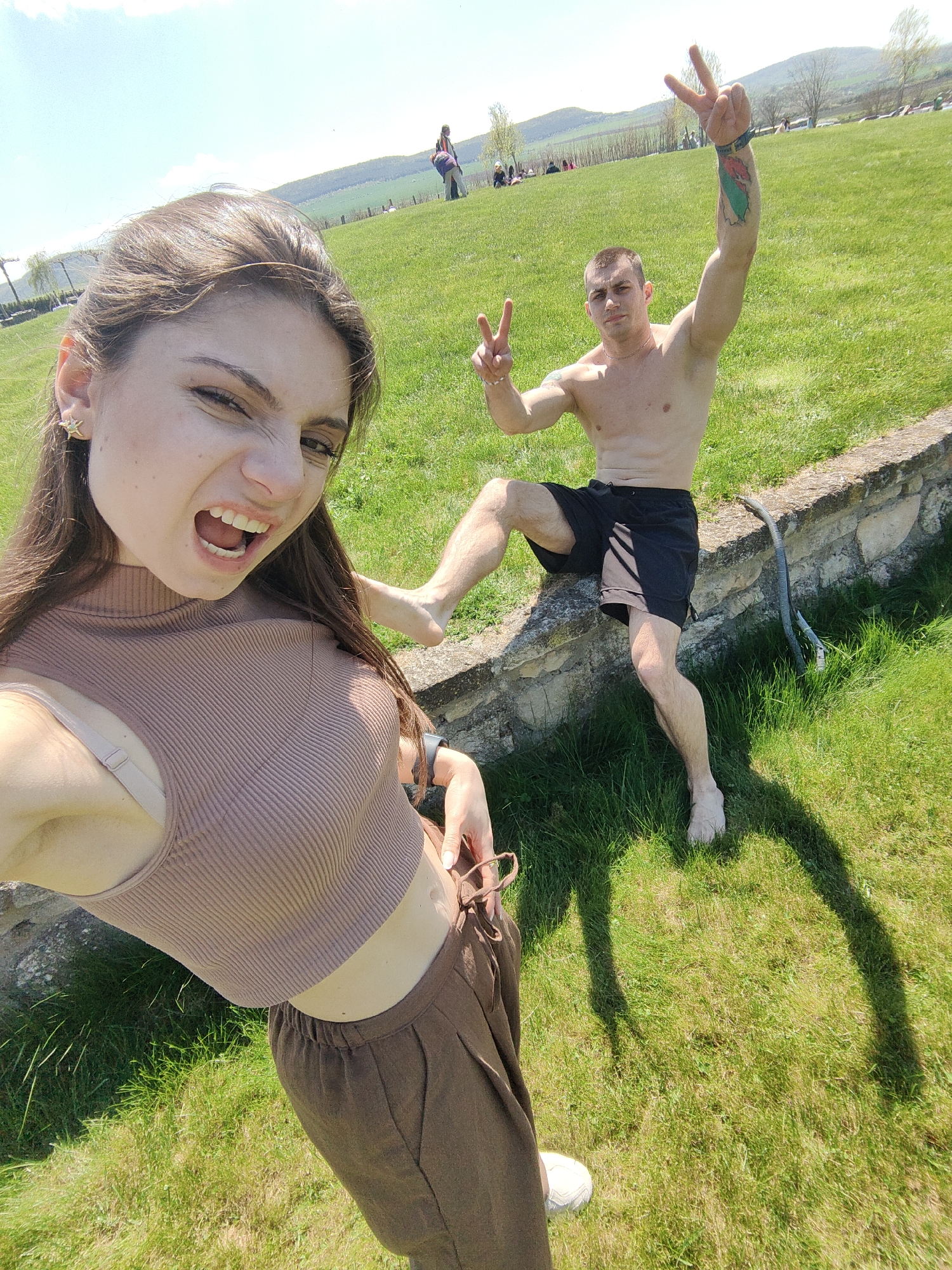 Woman takes selfie on hill in Devnya, Bulgaria