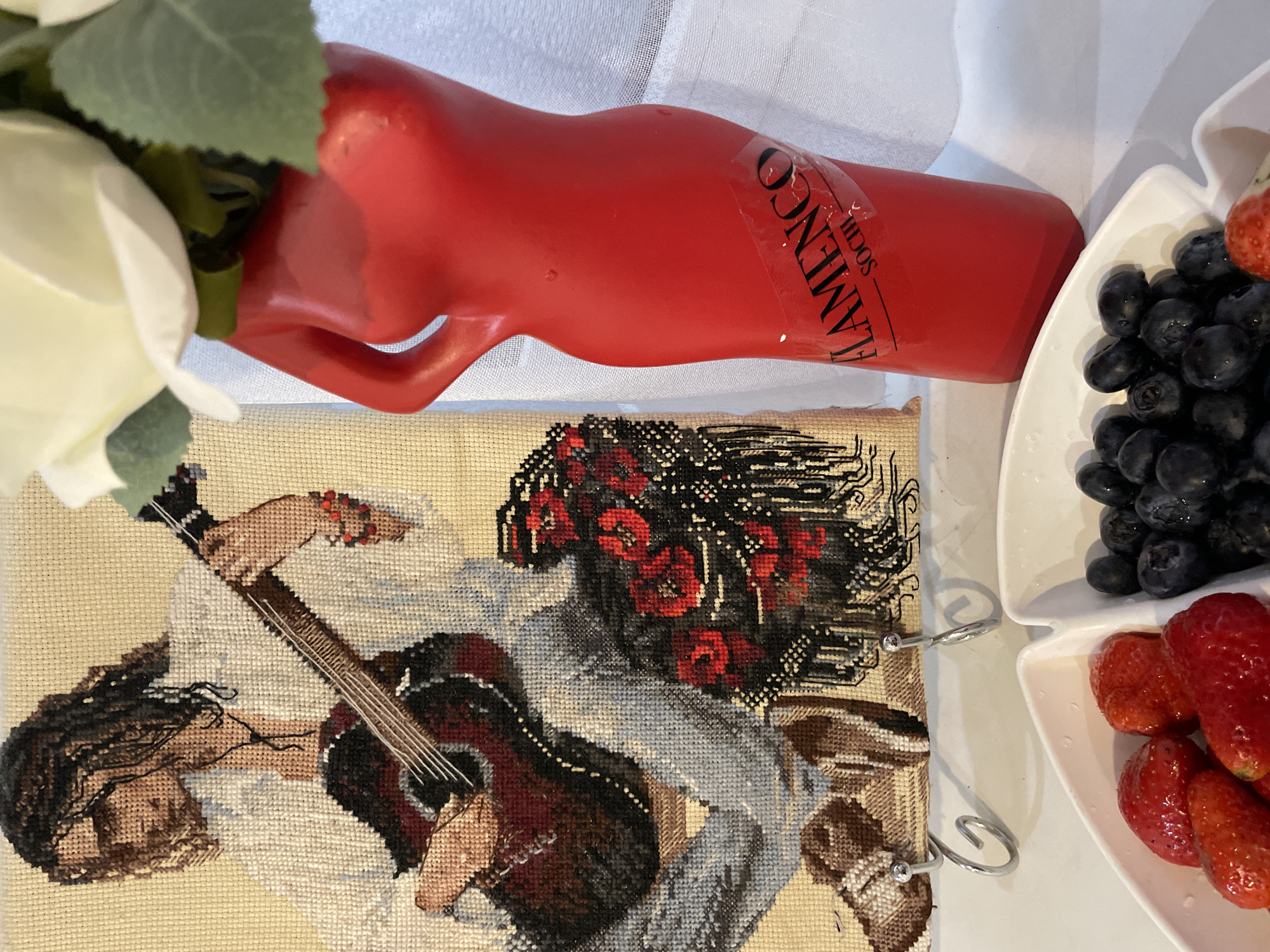 Everyday scenes documented in Sochi: flamenco crafts, fresh berries, local storefront