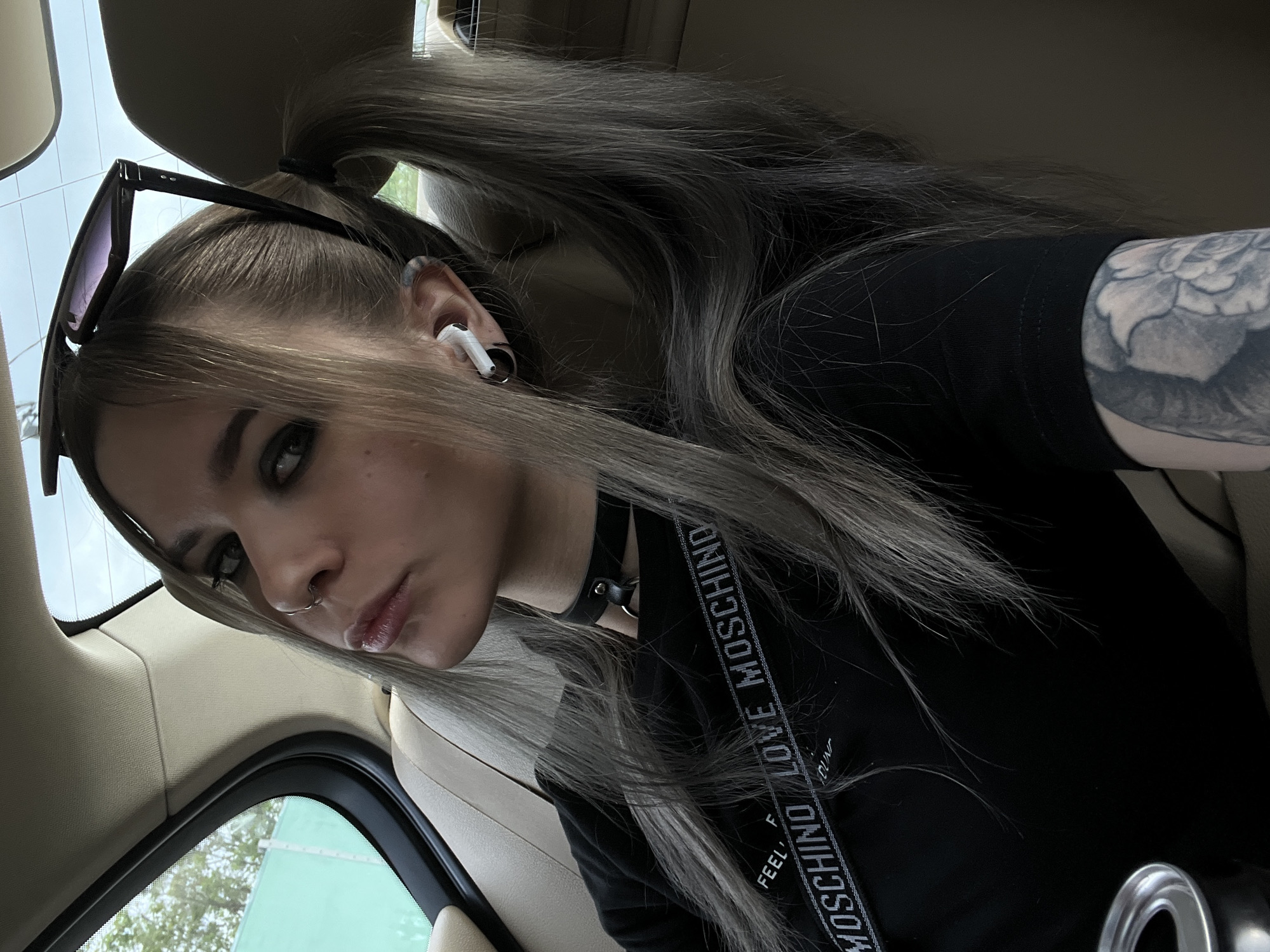 Casual photos captured in Khimki: woman in vehicle, urban buildings