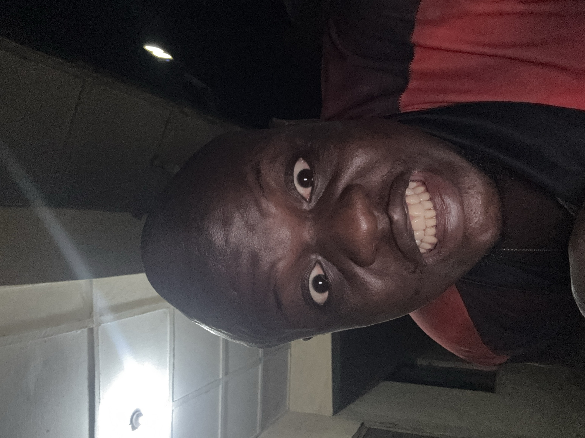 Portrait of smiling man captured in Minna, Nigeria