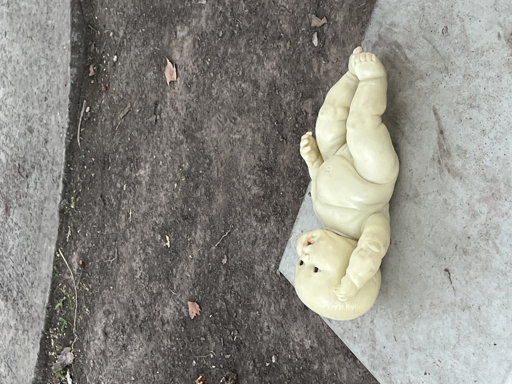 Abandoned baby doll found upside down in Olivos, Argentina
