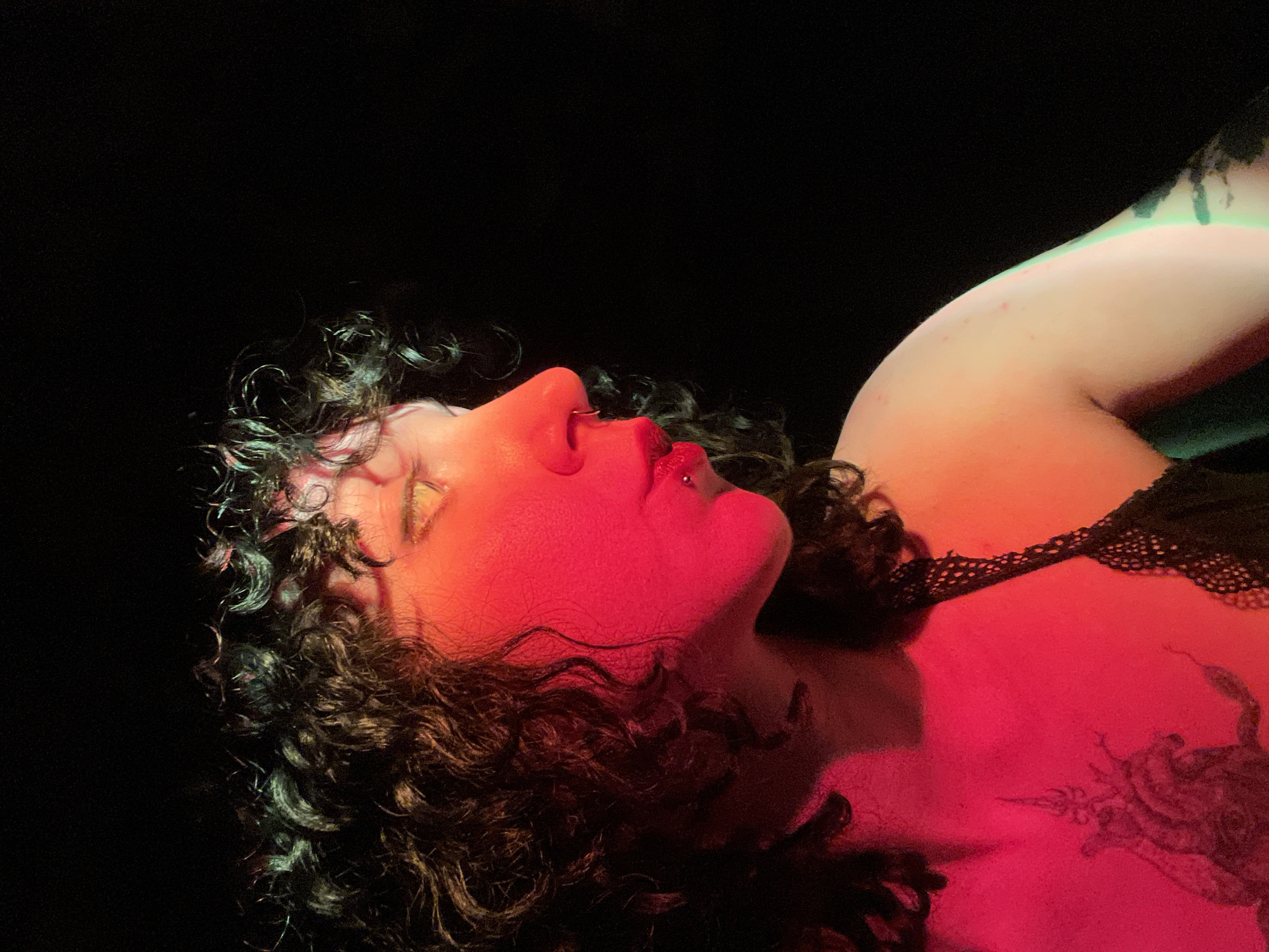 Portrait captured in dramatic red lighting in Belgrade suburb