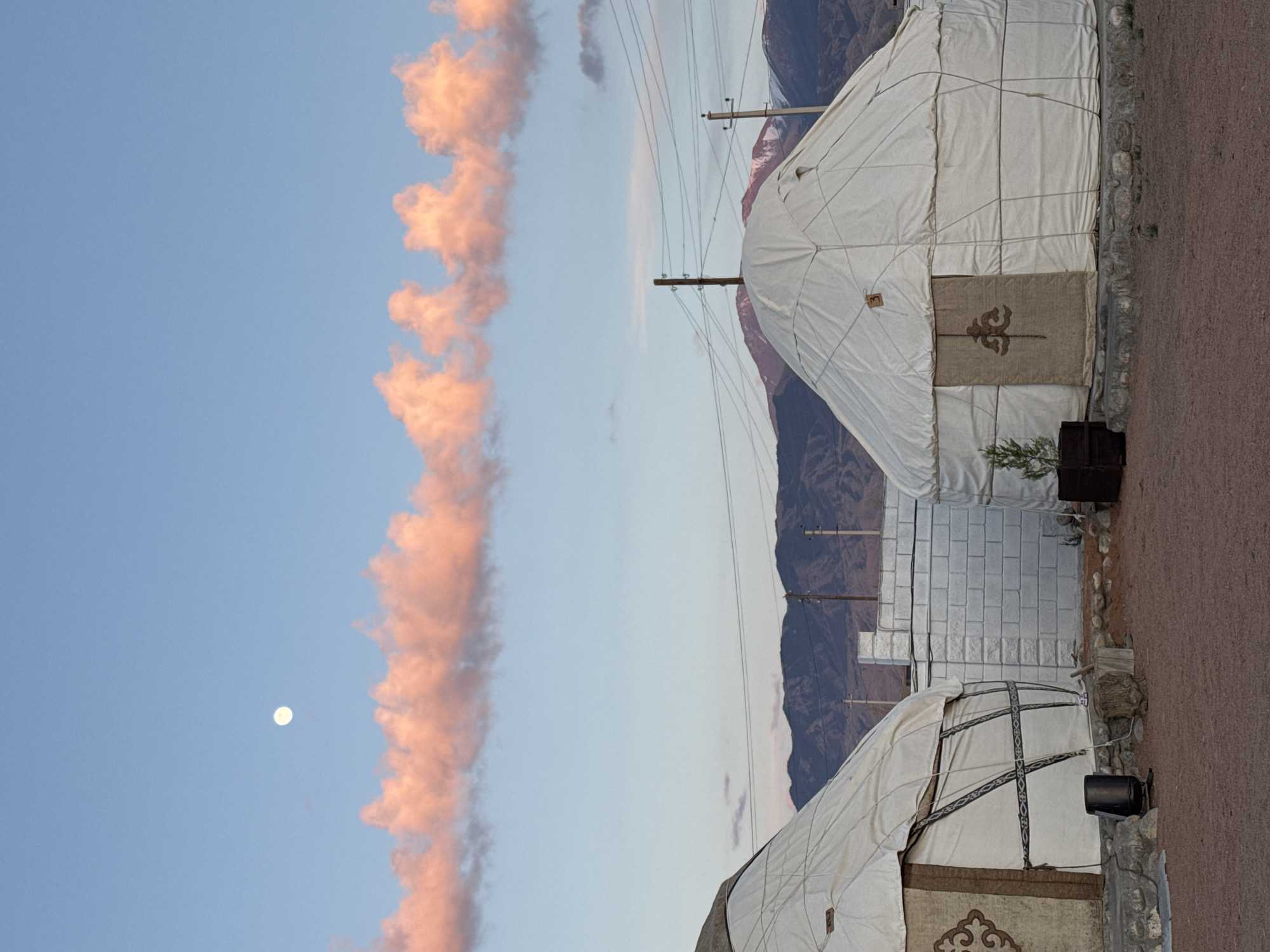 Traditional yurts spotted in mountainous Tong, Kyrgyzstan