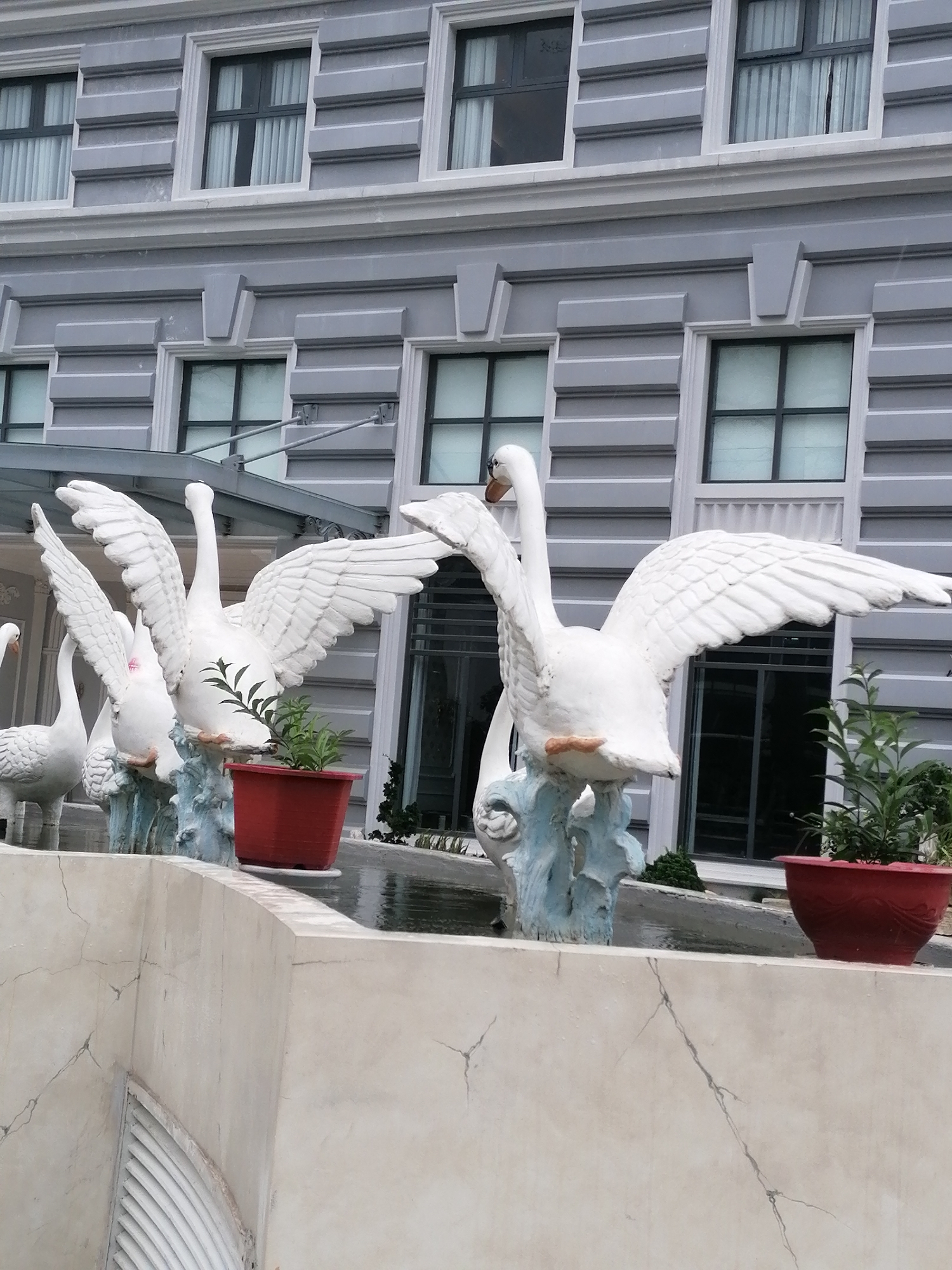 Decorative garden sculptures and topiaries documented in Da Lat