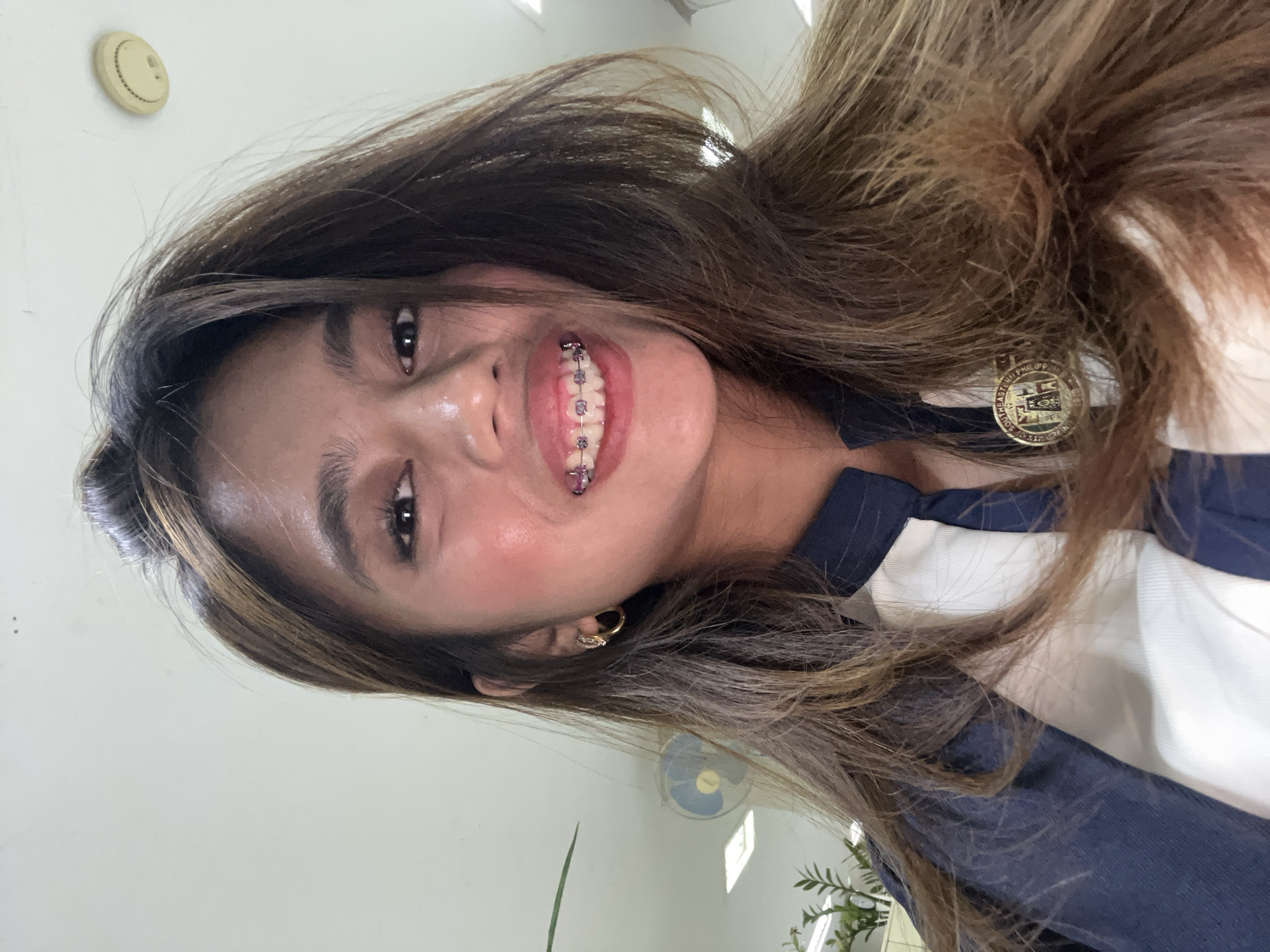 University staff day in Davao — uniforms, elevators, and office life