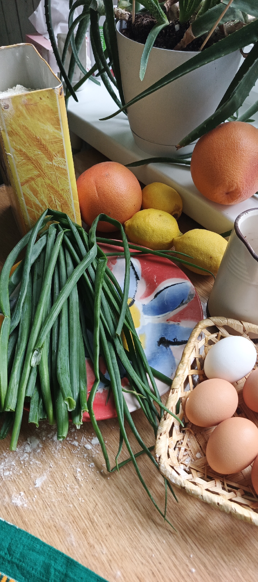 Home kitchen cooking session with scattered unrelated street scenes