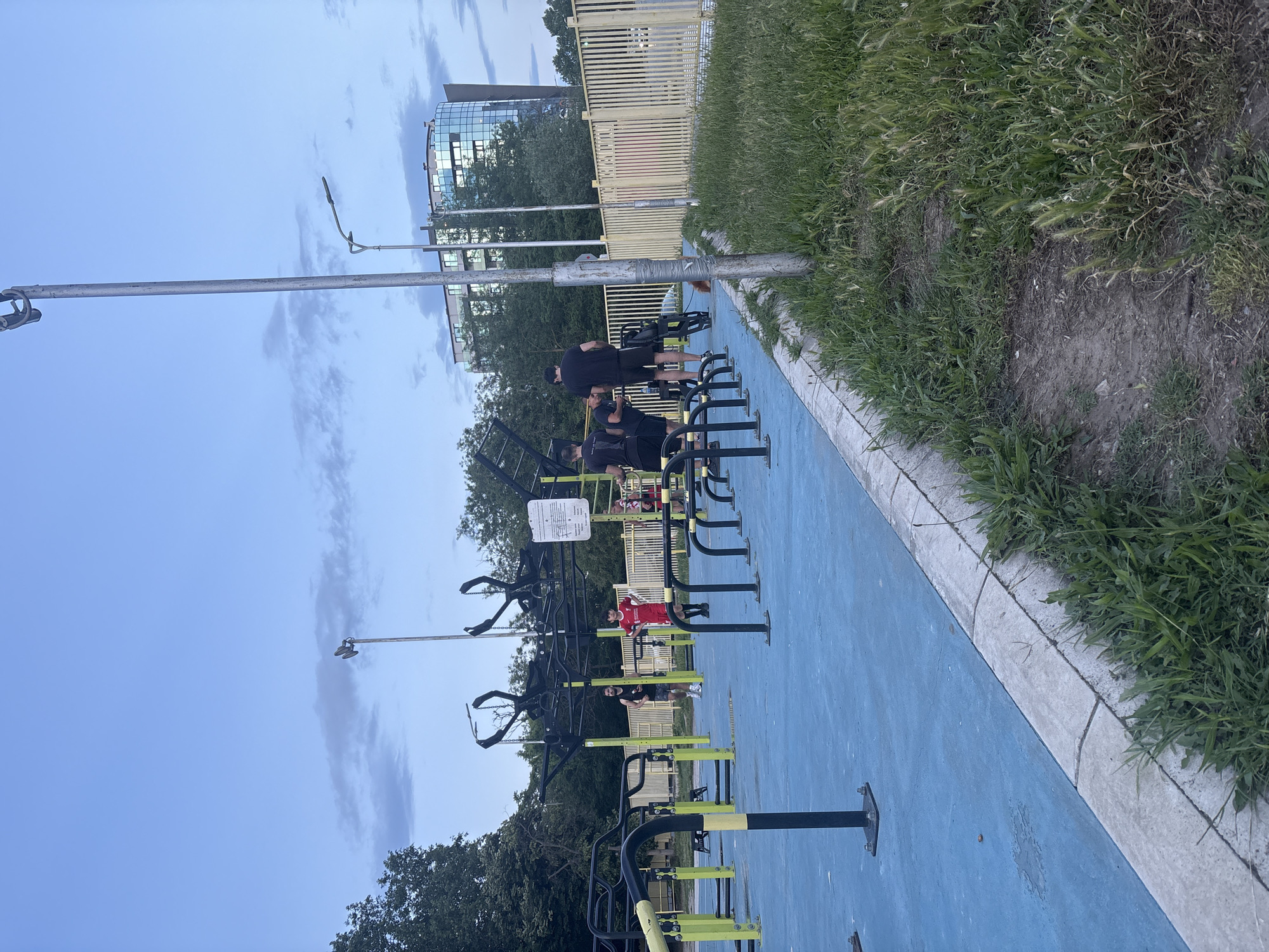 Evening fitness parks and sports courts documented across urban area