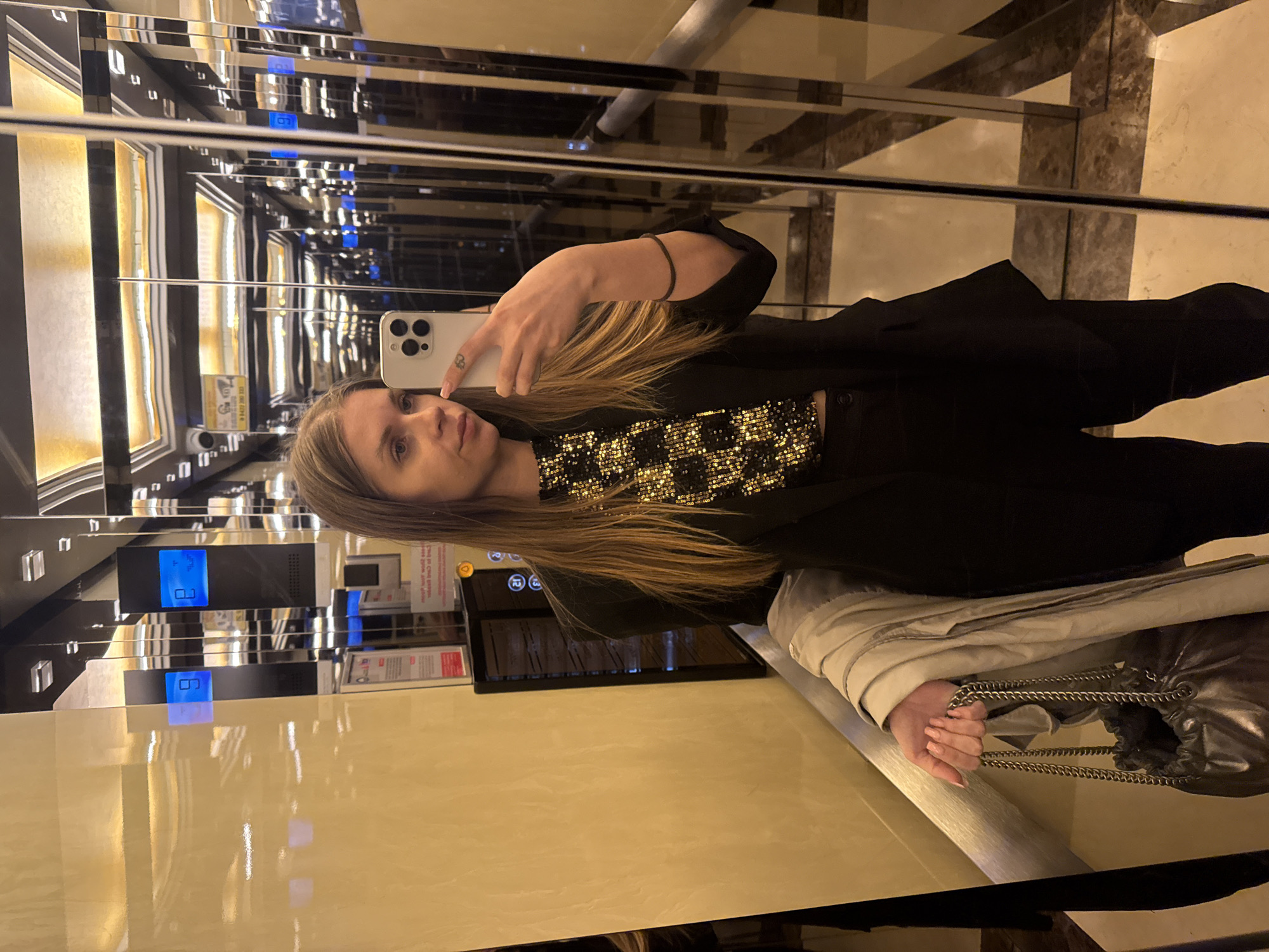 Woman takes elevator selfie in Batumi, Georgia