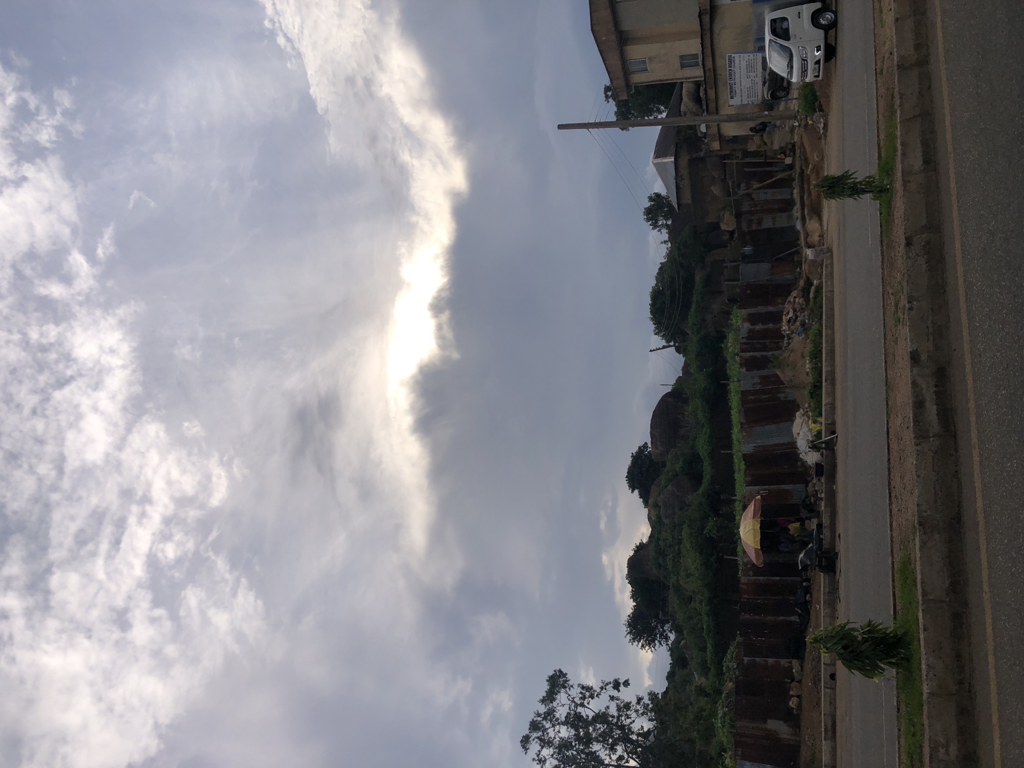Street life and commerce on a Jos, Nigeria road