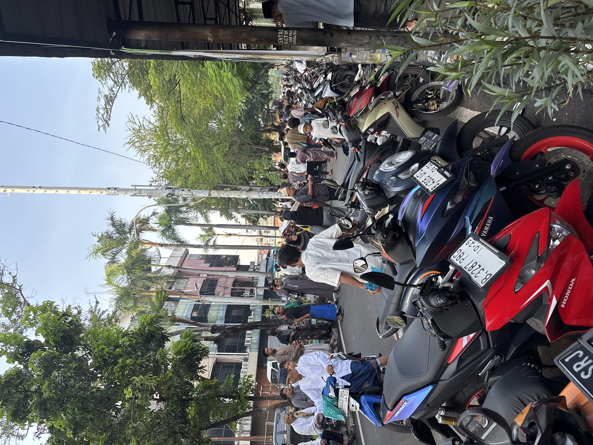 Urban life scenes captured across Central Jakarta morning
