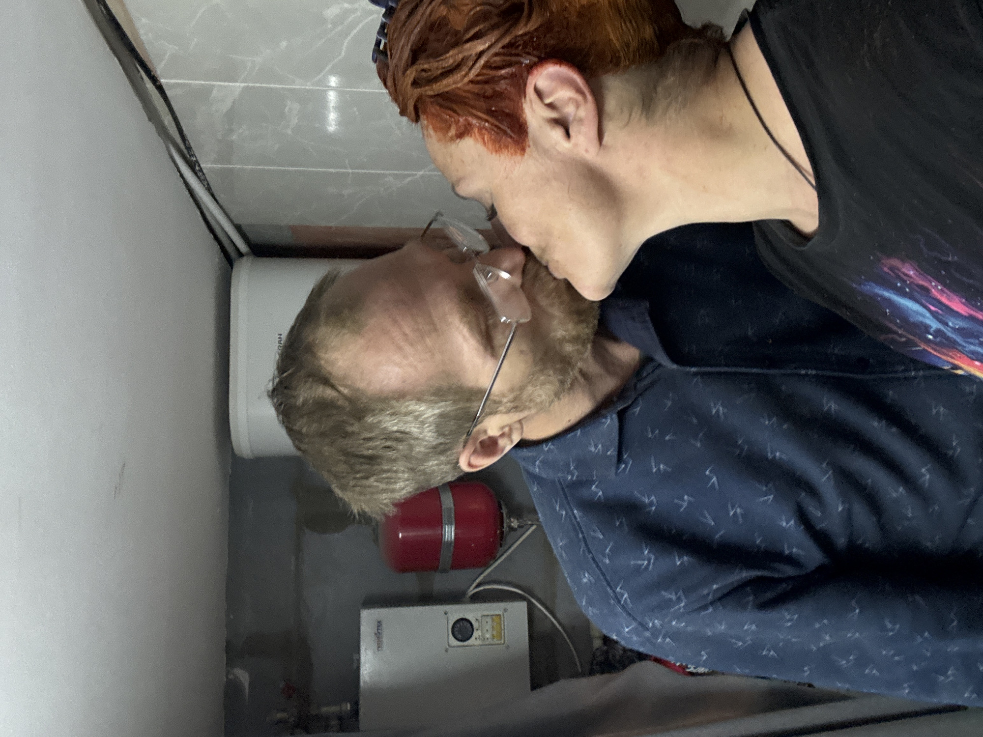 Couple shares intimate hair dyeing session in Chaikovsky bathroom