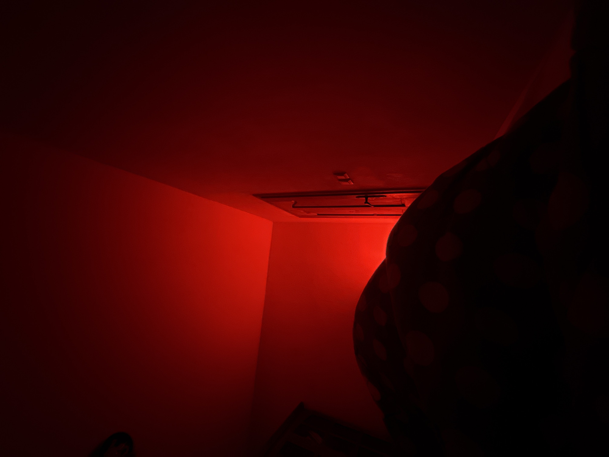 Red-lit interior room documented in Dobrich, Bulgaria