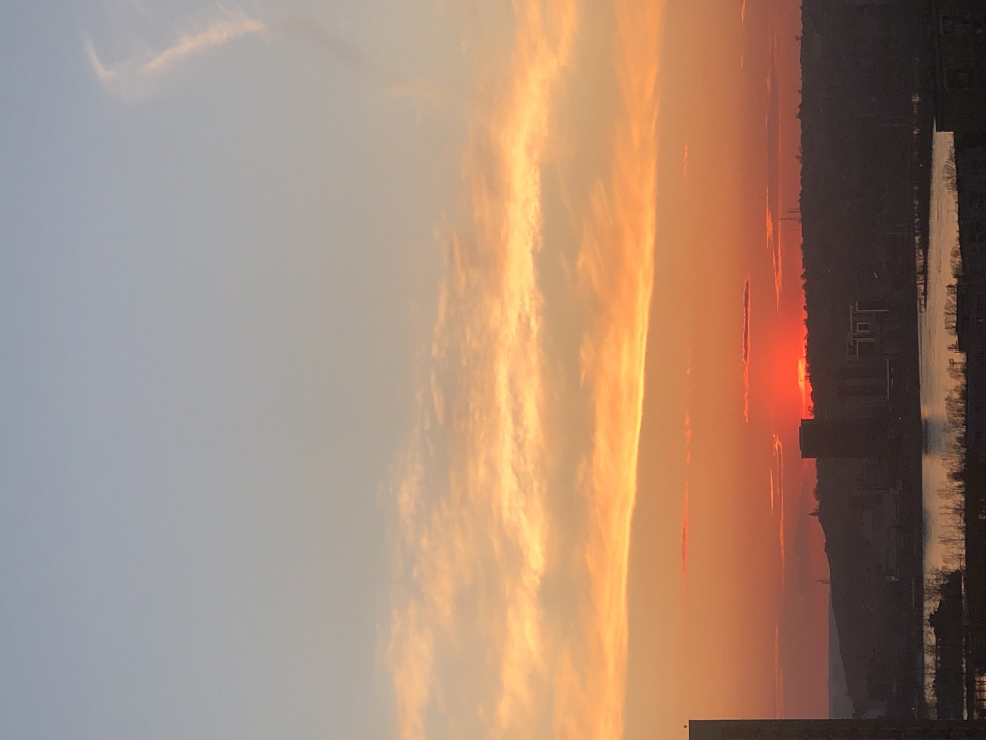 Sunset observed over Krasnoyarsk, Russia displays colorful sky gradient