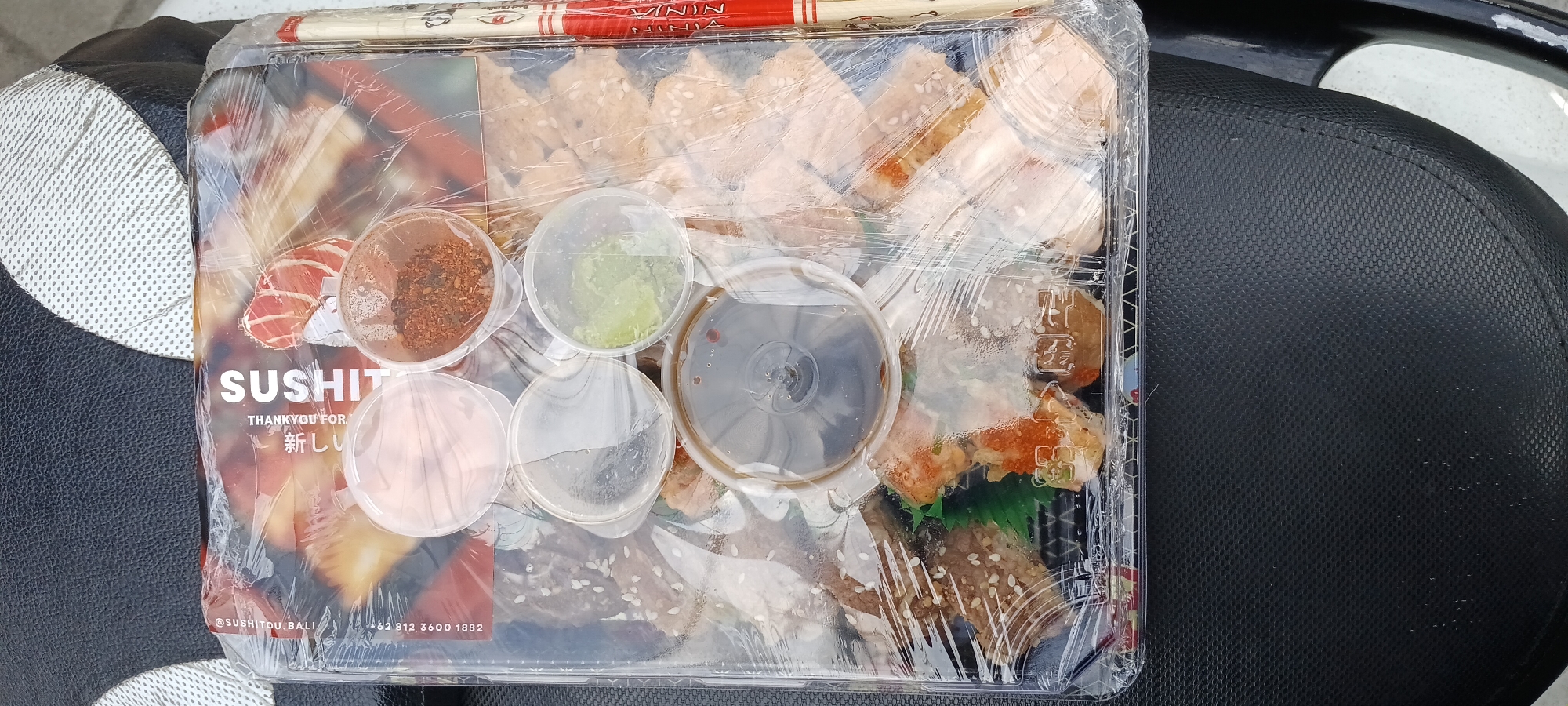 Sushi takeaway container spotted at a North Kuta food spot