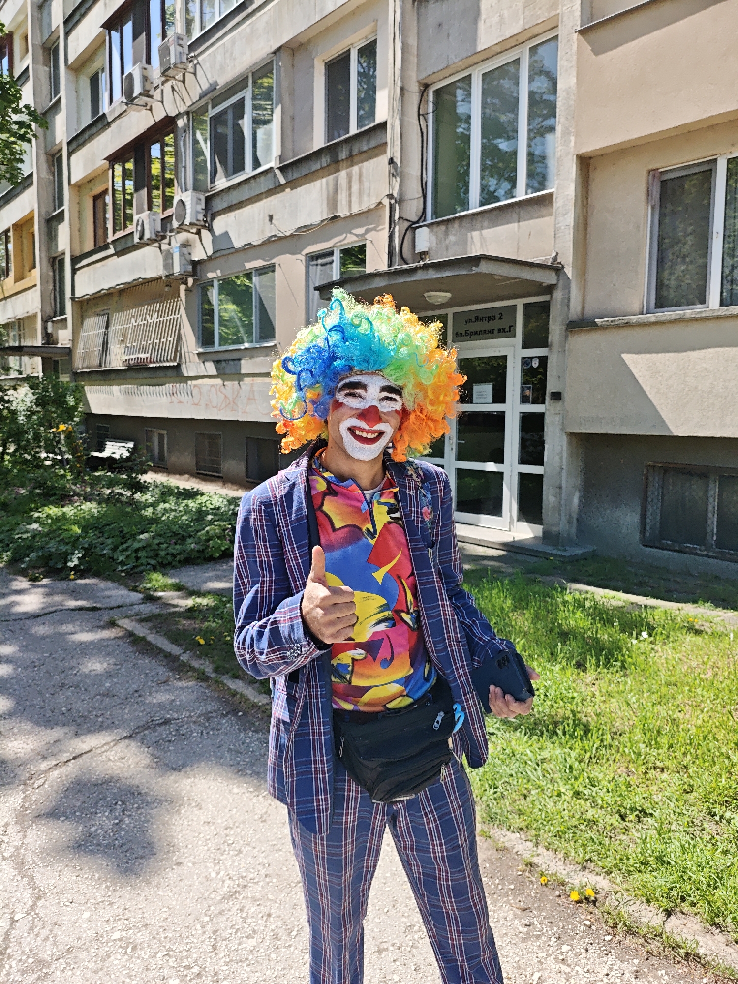 Costumed clown spotted on sidewalk in Ruse, Bulgaria